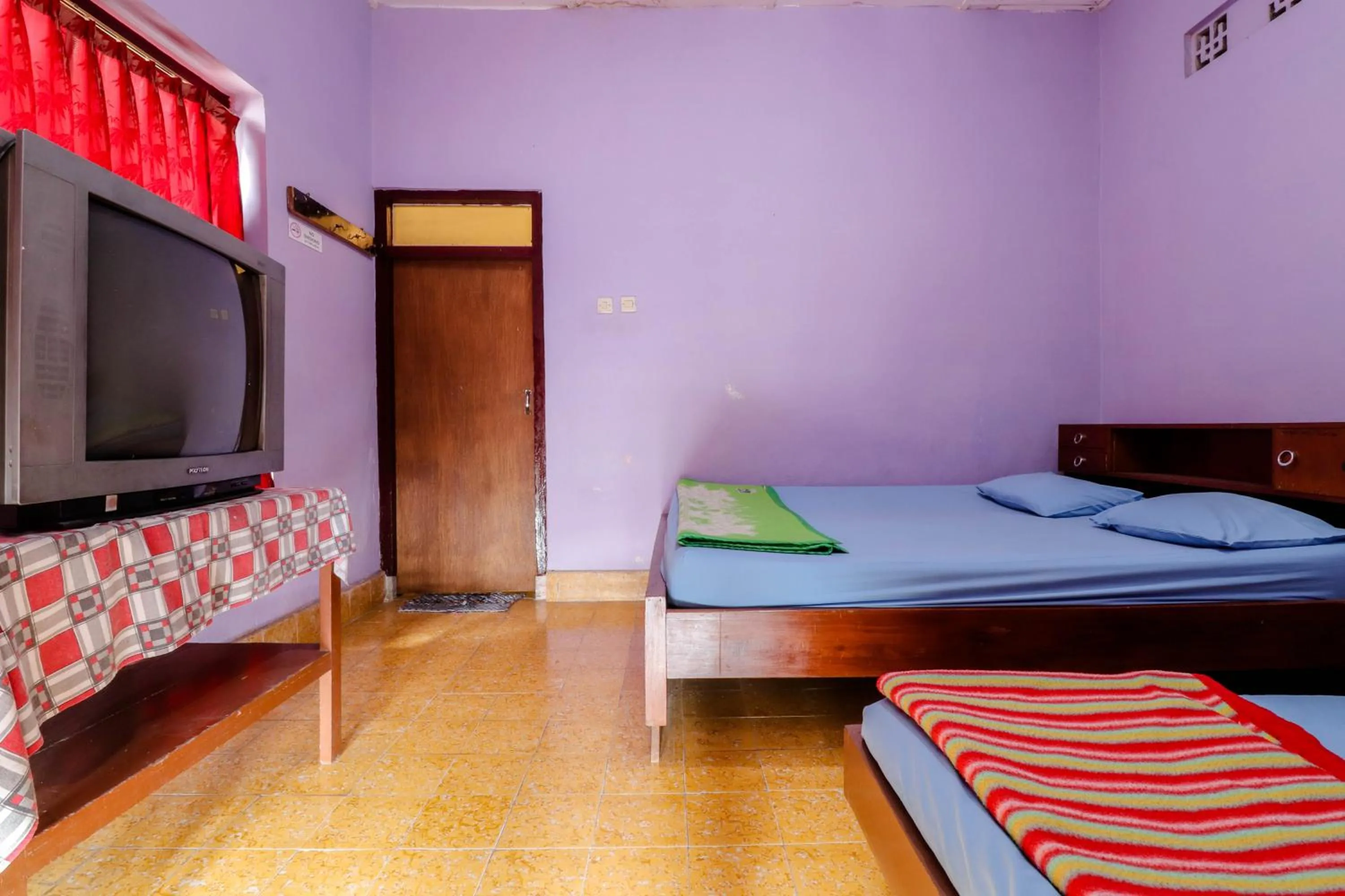 Bed in Penginapan Sedyo Rahayu