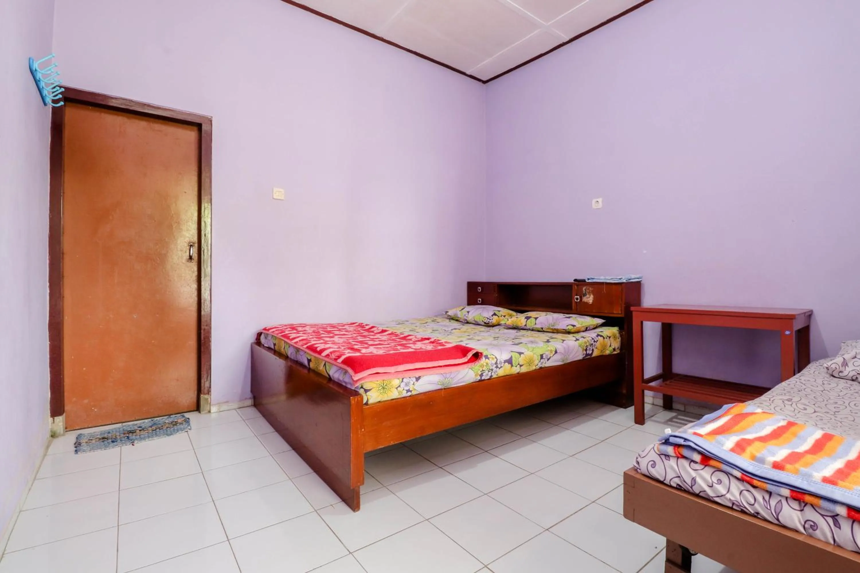 Bed in Penginapan Sedyo Rahayu