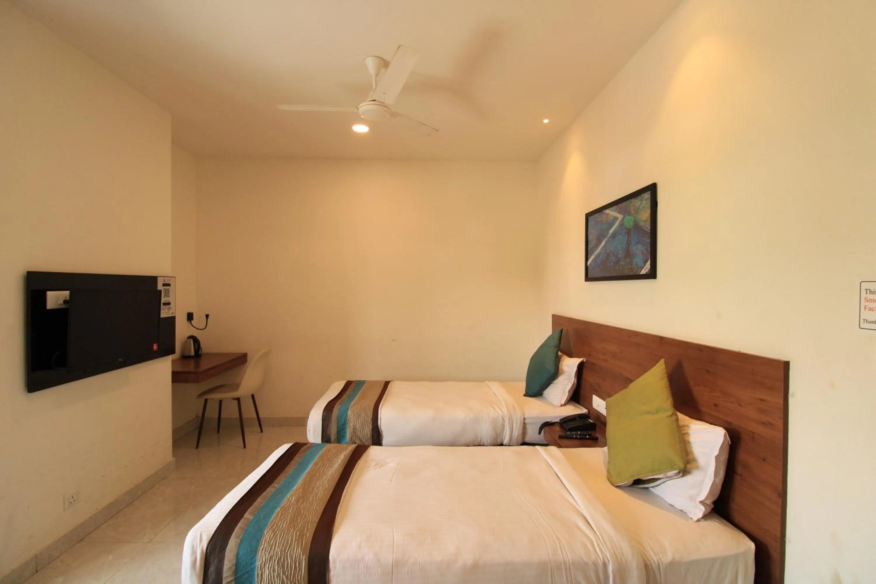 Bedroom, Bed in Arunaa Inn Airport Hotel,Chennai