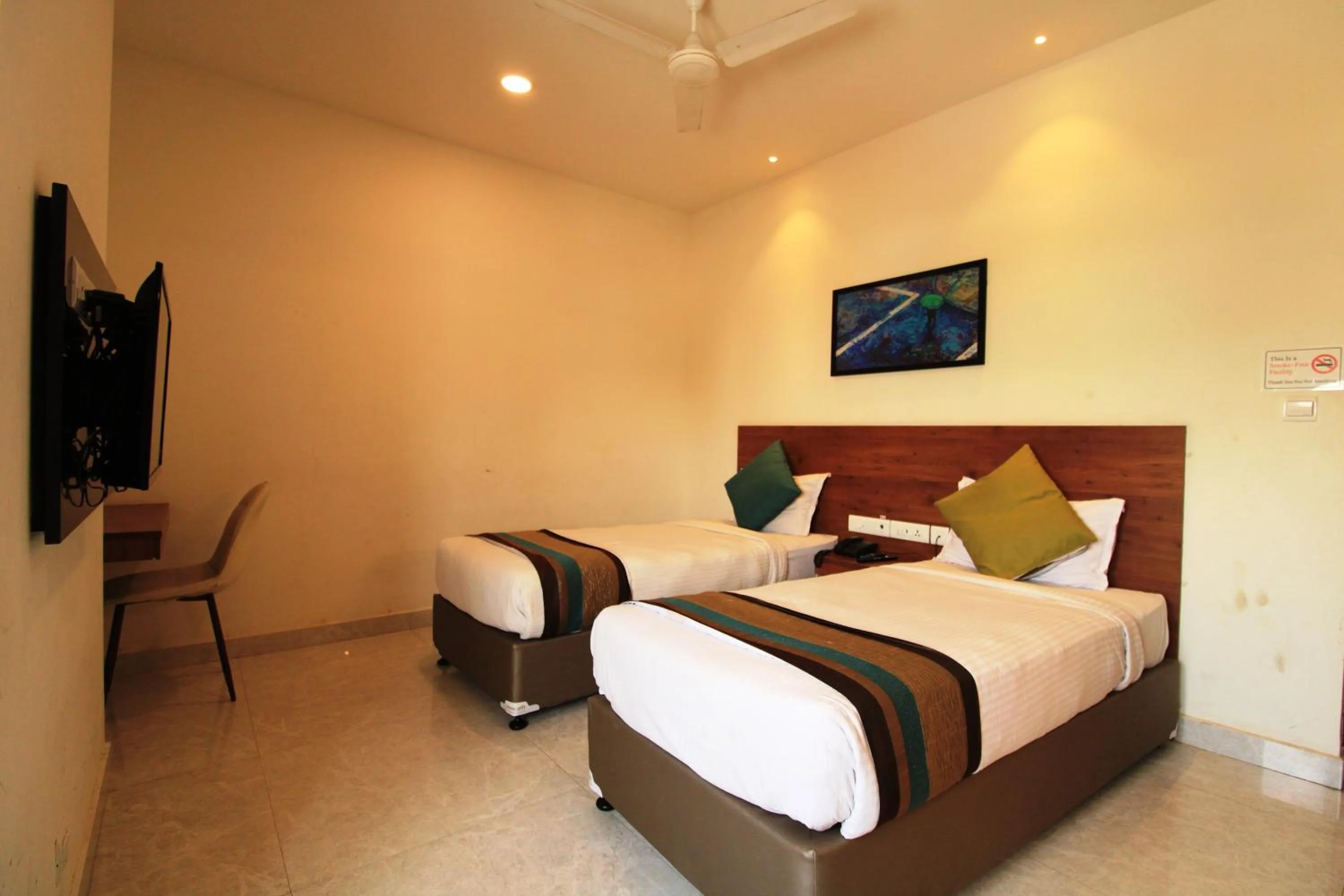 Bedroom, Bed in Arunaa Inn Airport Hotel,Chennai