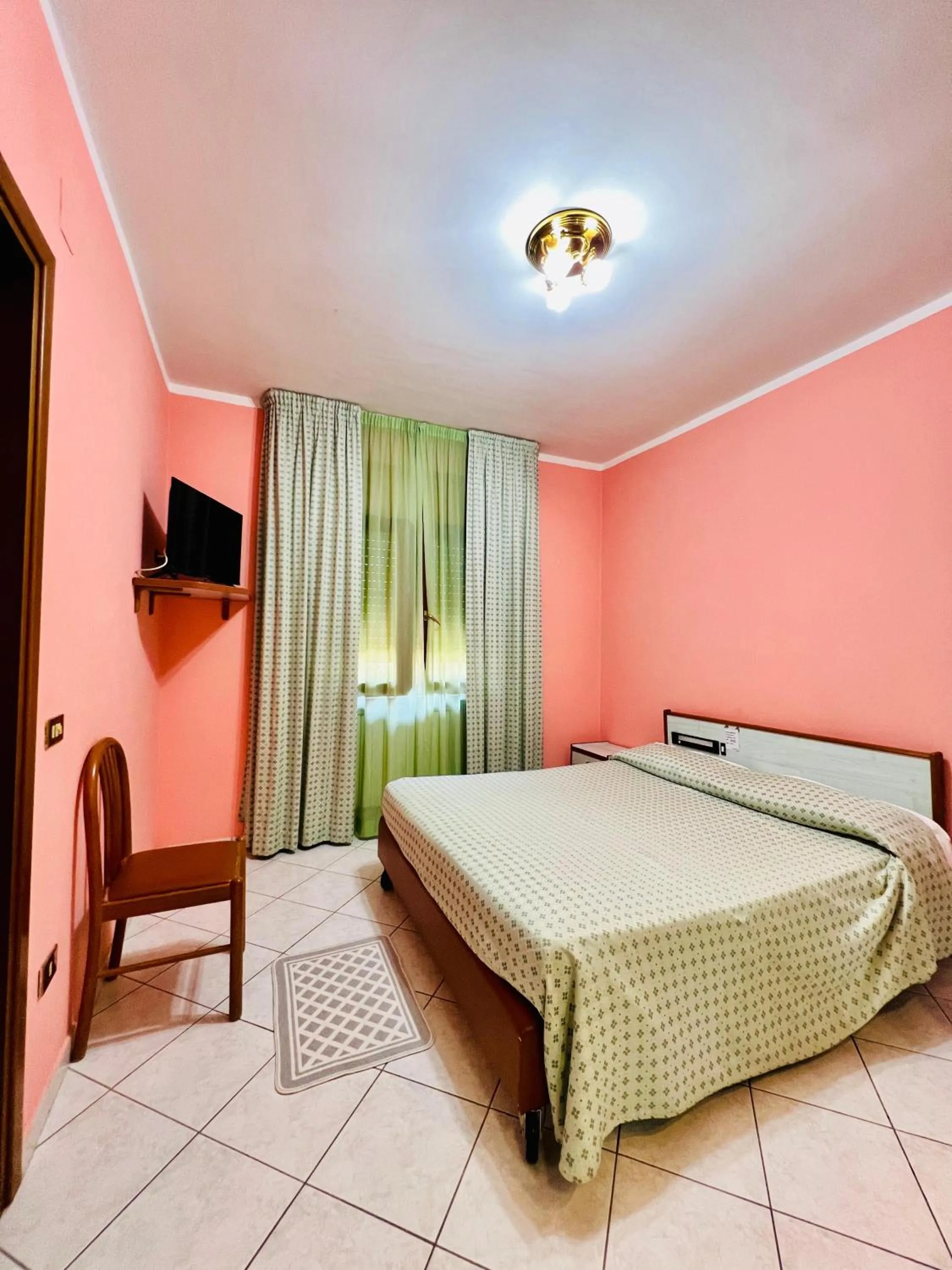 Bedroom in Hotel Paradiso