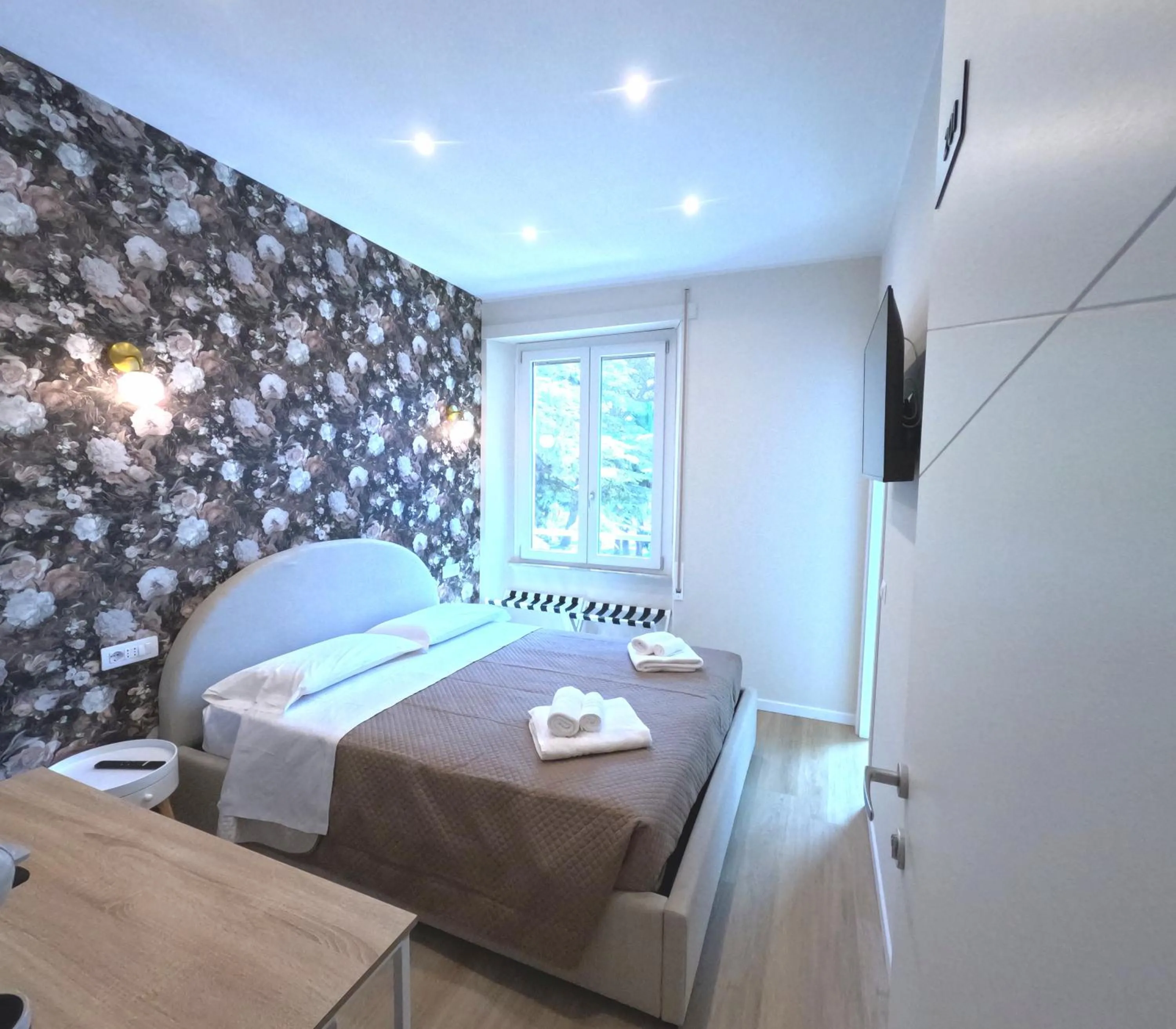 Bed in B&B Aurelia Garden Rooms