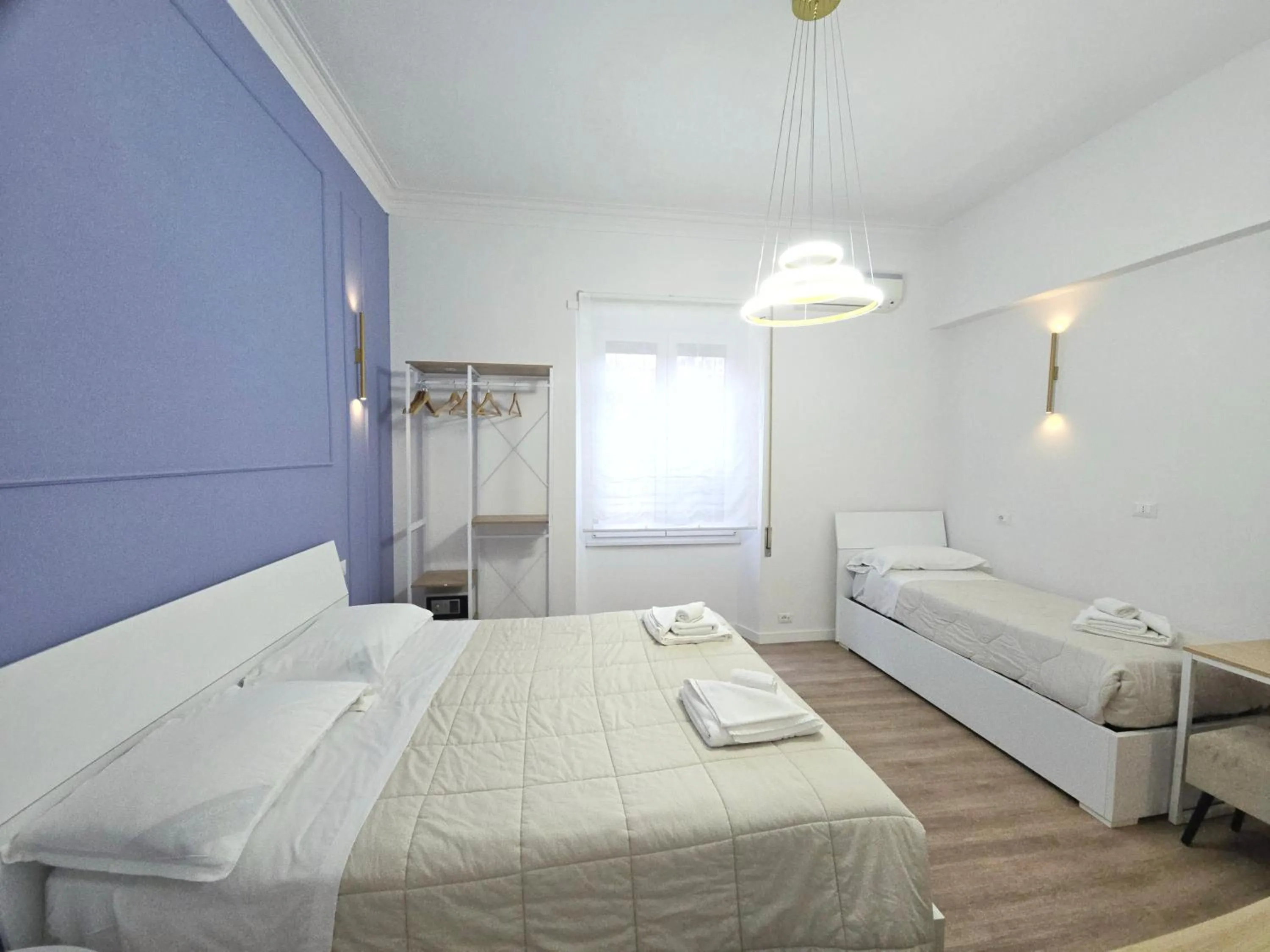 Bed in B&B Aurelia Garden Rooms