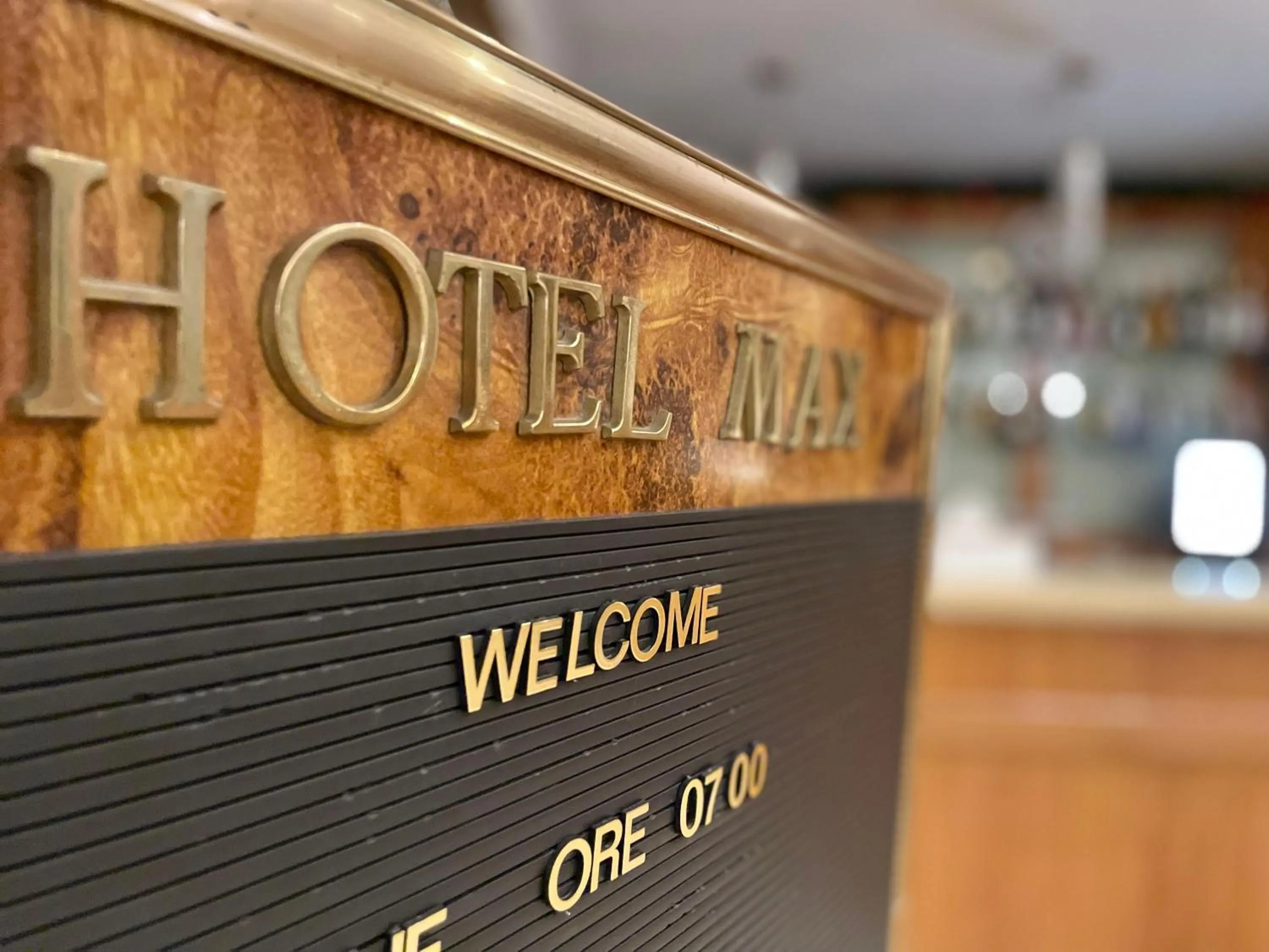 Property logo or sign in Hotel Max