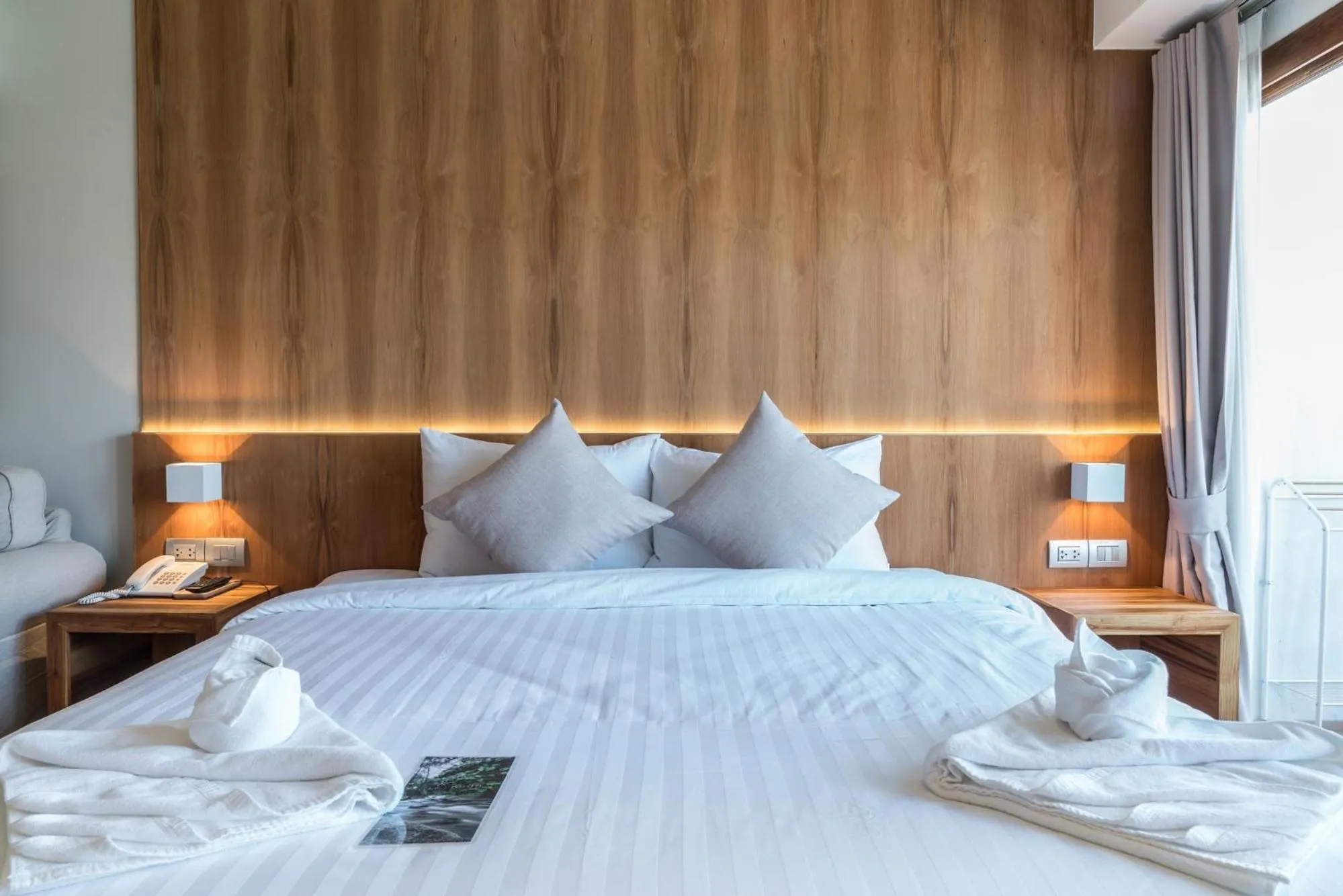 Bed in Nuan Boutique Hotel