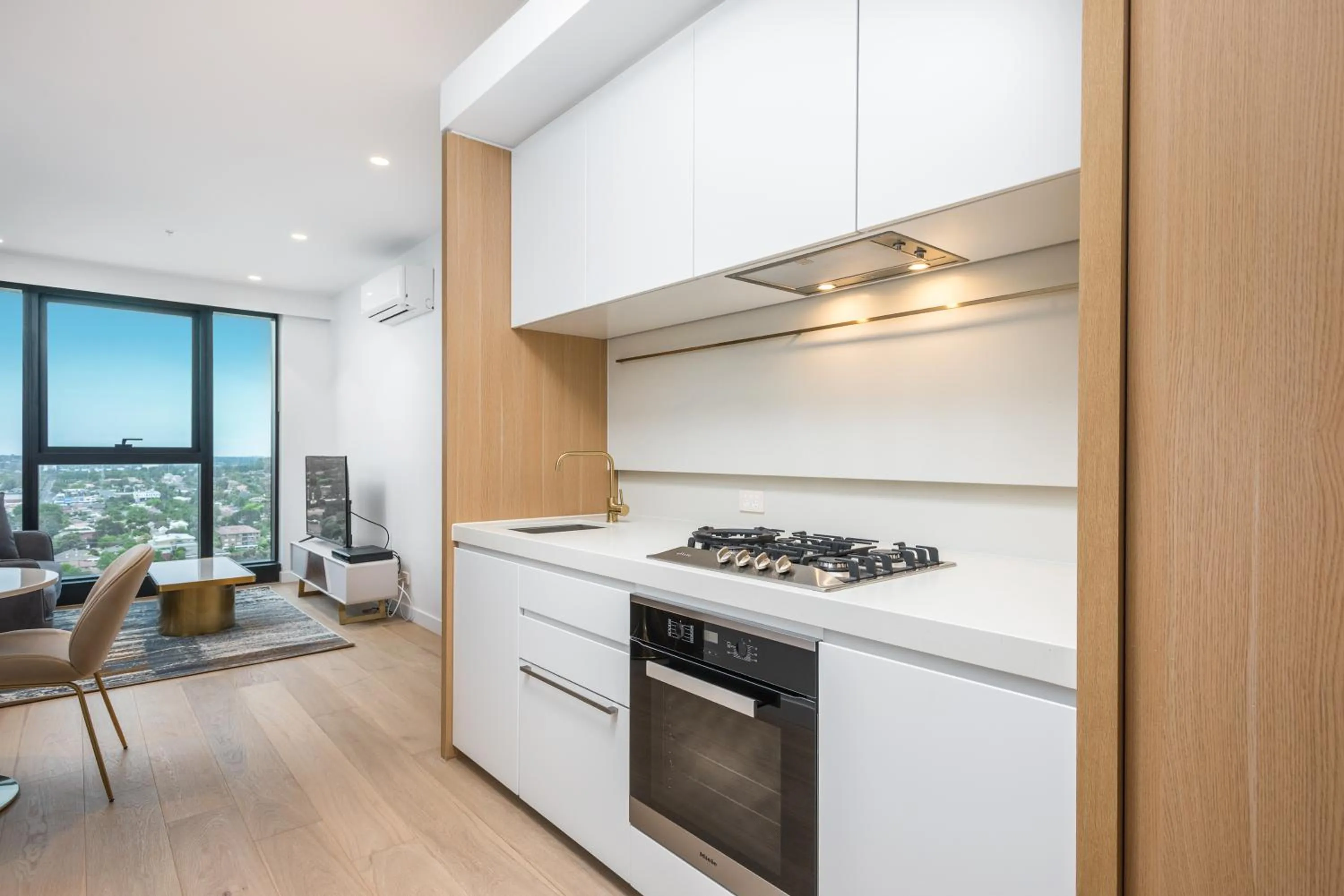 Kitchen or kitchenette in Sky One Apartments by CLLIX