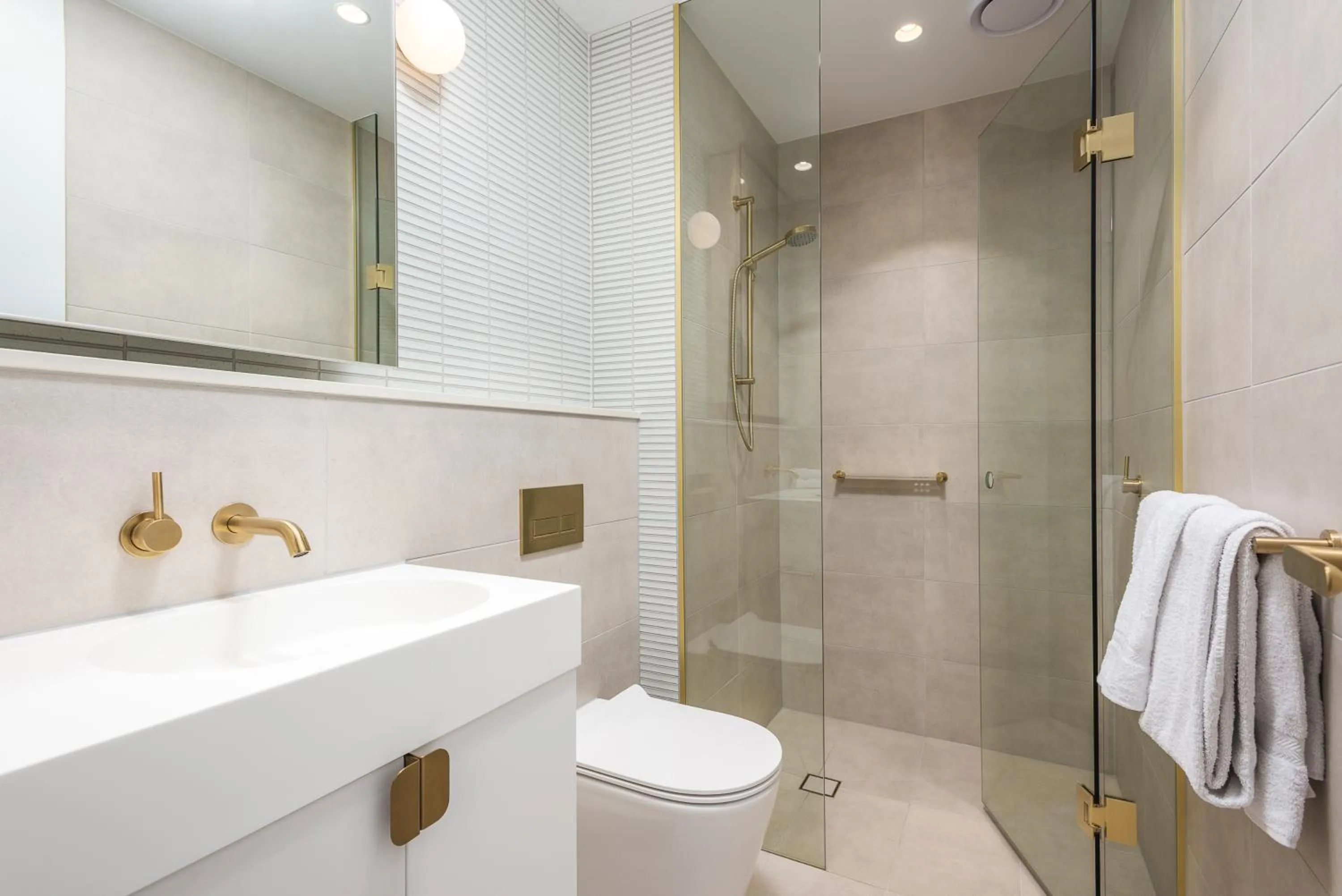 Toilet in Sky One Apartments by CLLIX