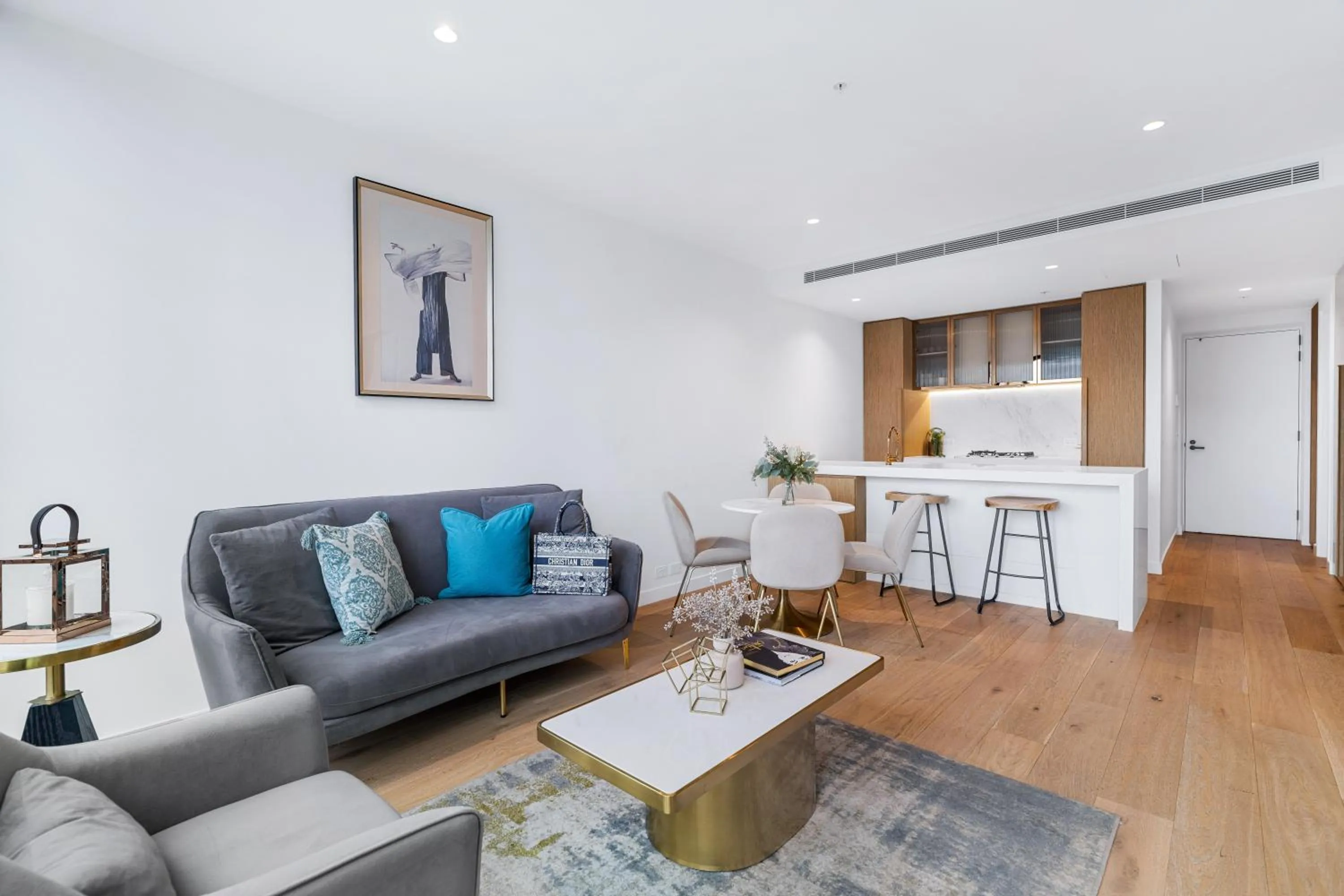 Living room in Collins House Apartments by CLLIX