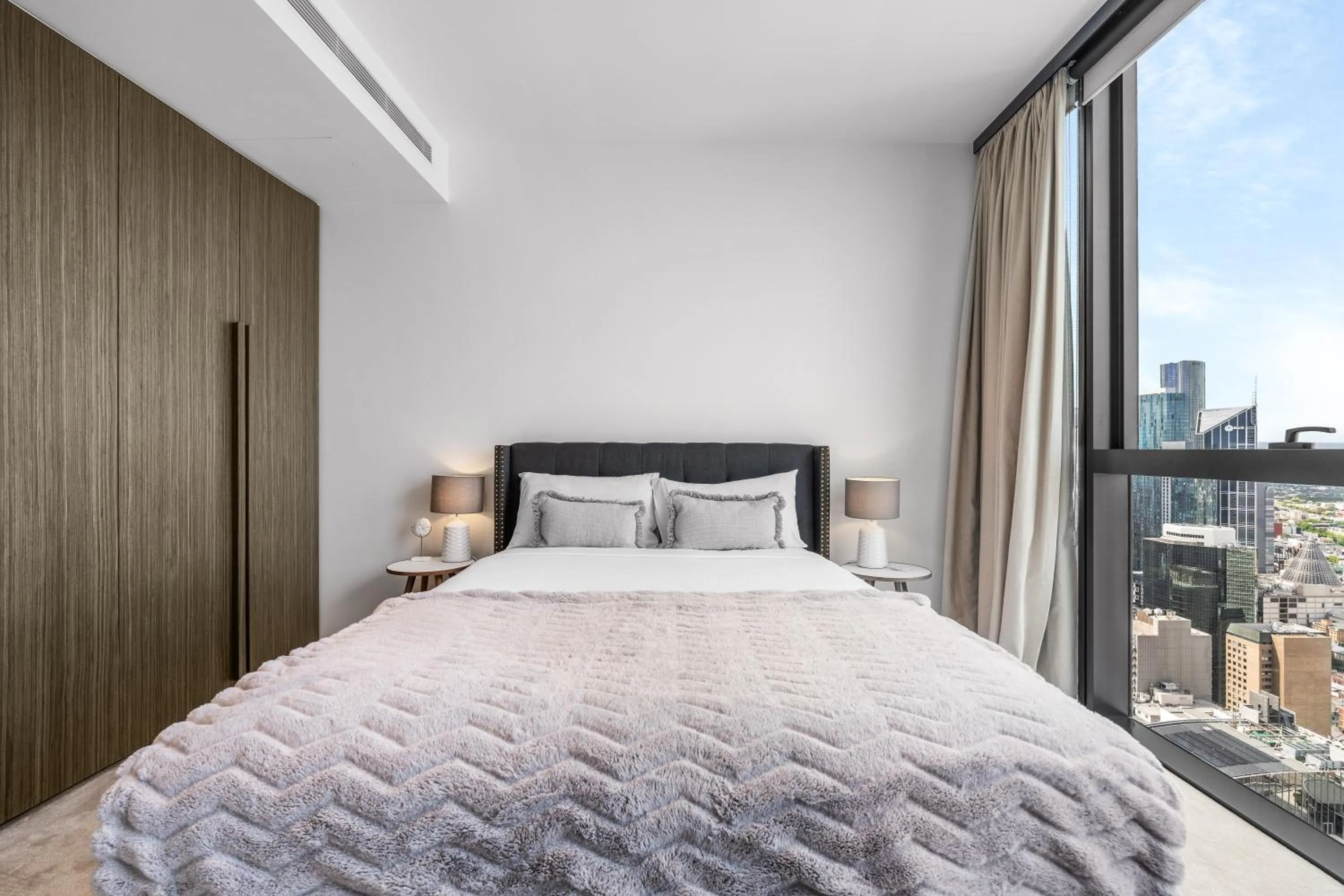 Bed in Collins House Apartments by CLLIX