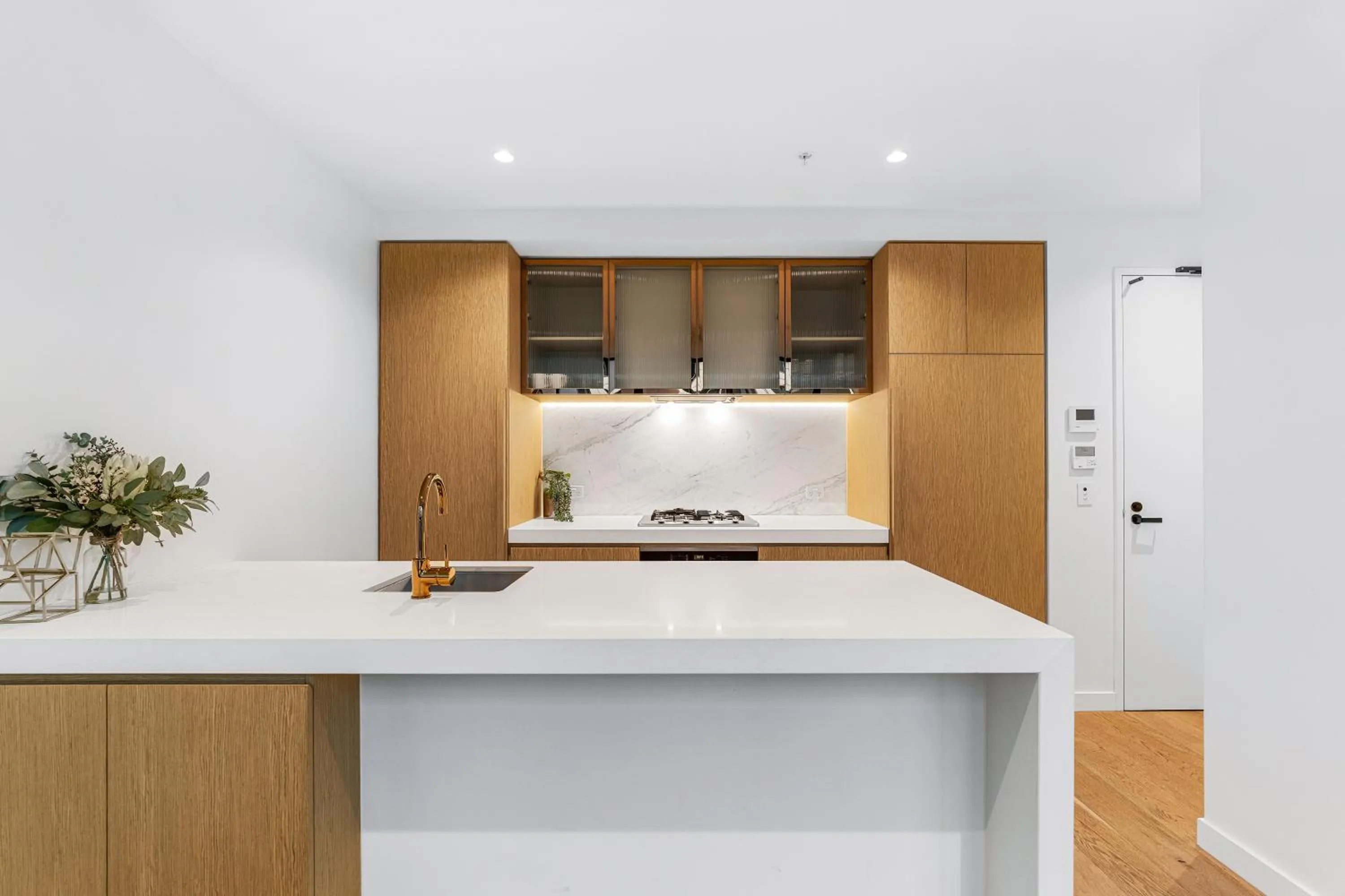 Kitchen or kitchenette in Collins House Apartments by CLLIX