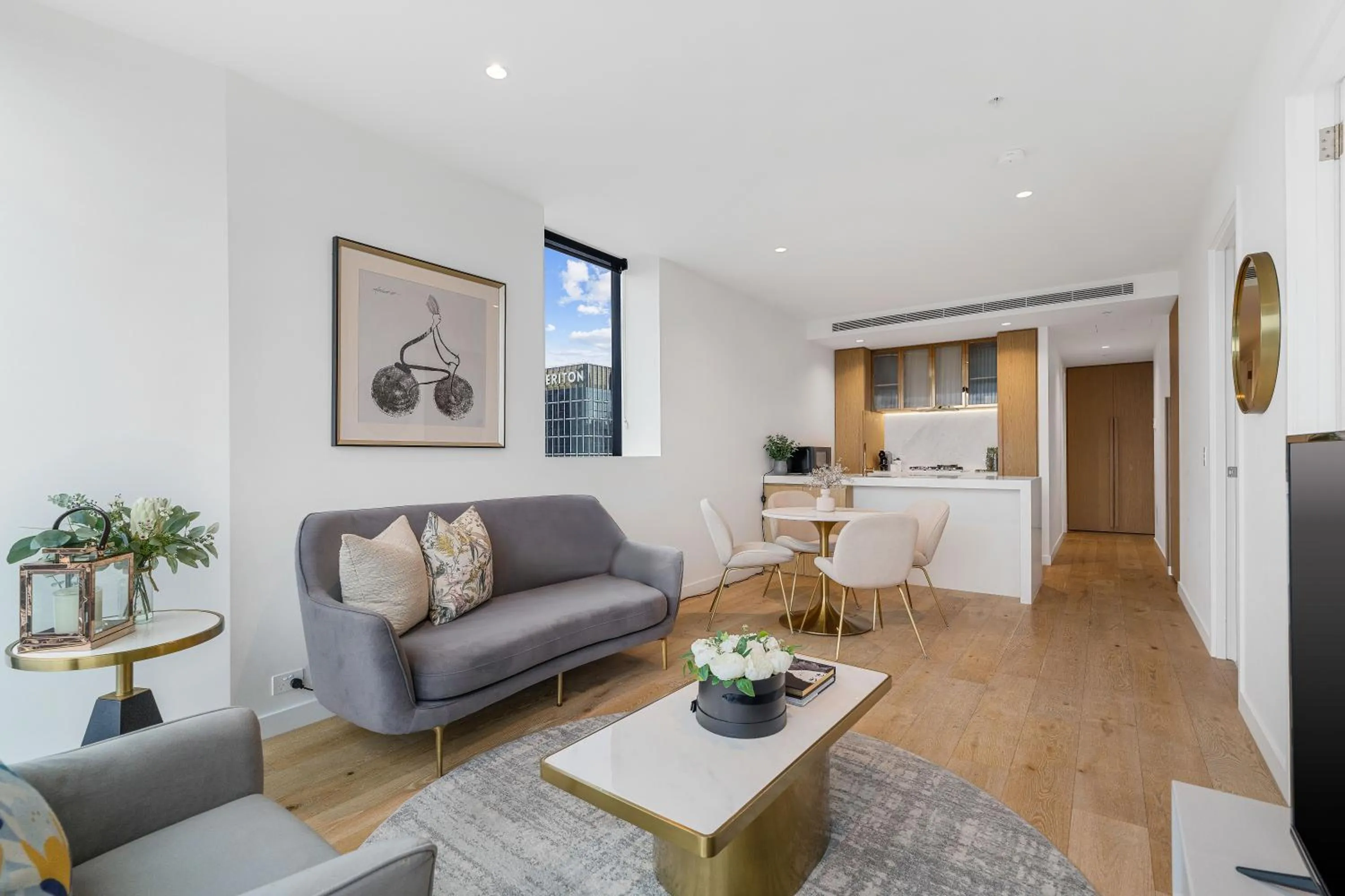 Living room, Bed in Collins House Apartments by CLLIX