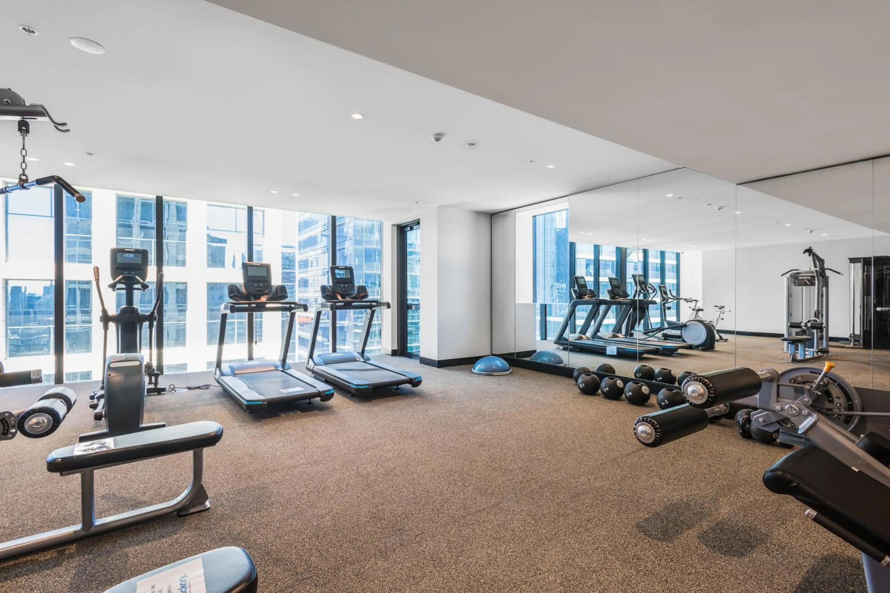 Fitness centre/facilities in Collins House Apartments by CLLIX