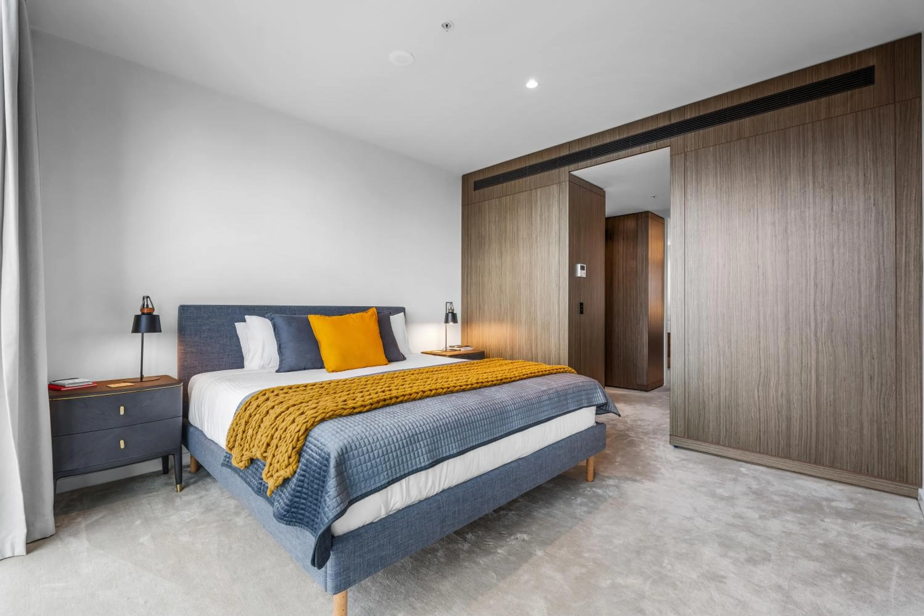 Bed in Collins House Apartments by CLLIX