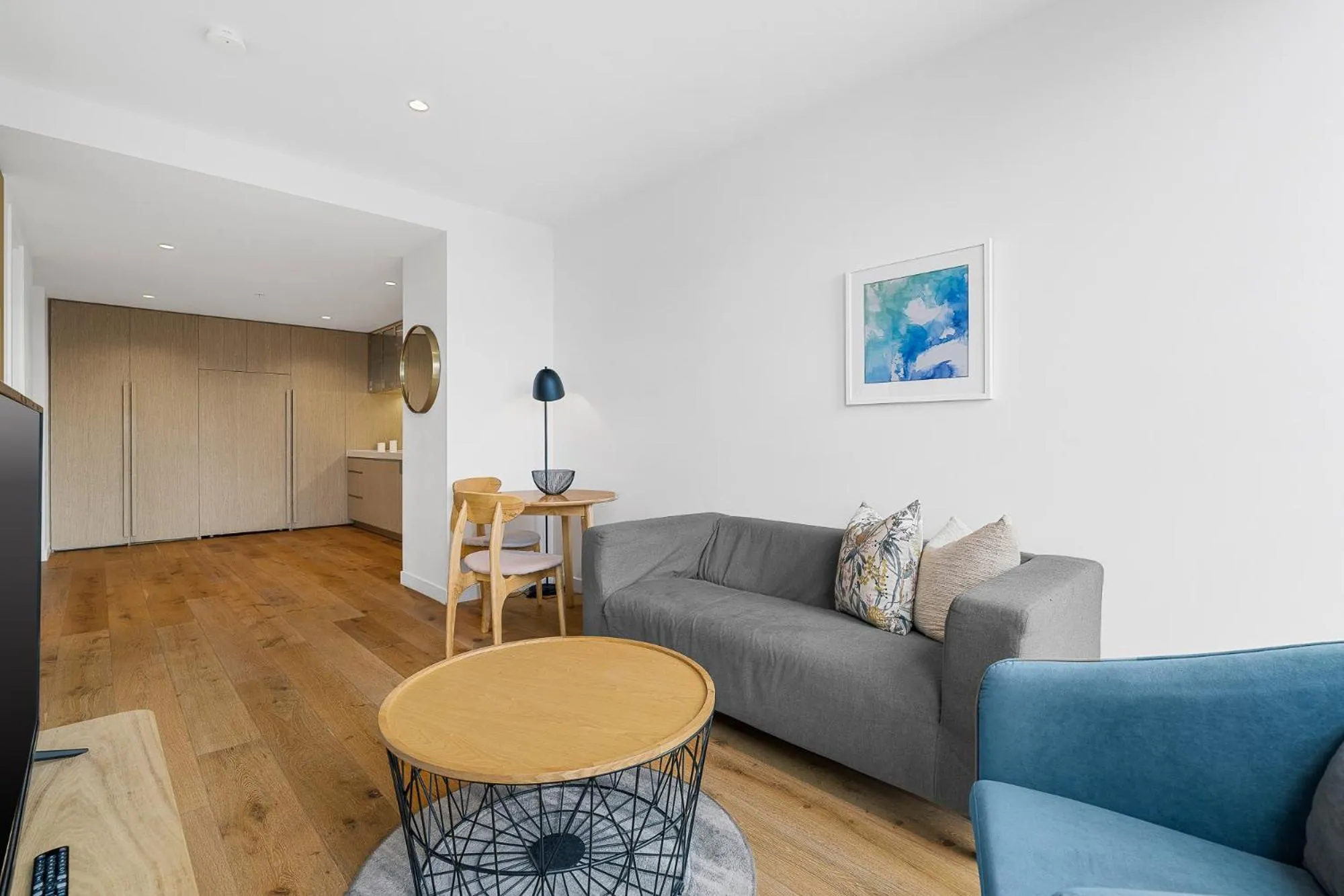 Living room in Collins House Apartments by CLLIX