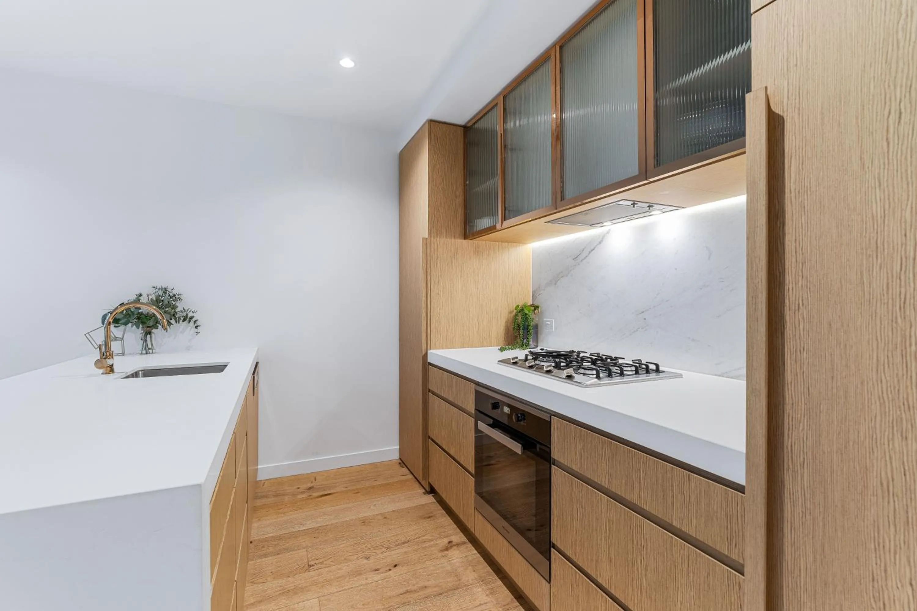 Kitchen or kitchenette in Collins House Apartments by CLLIX