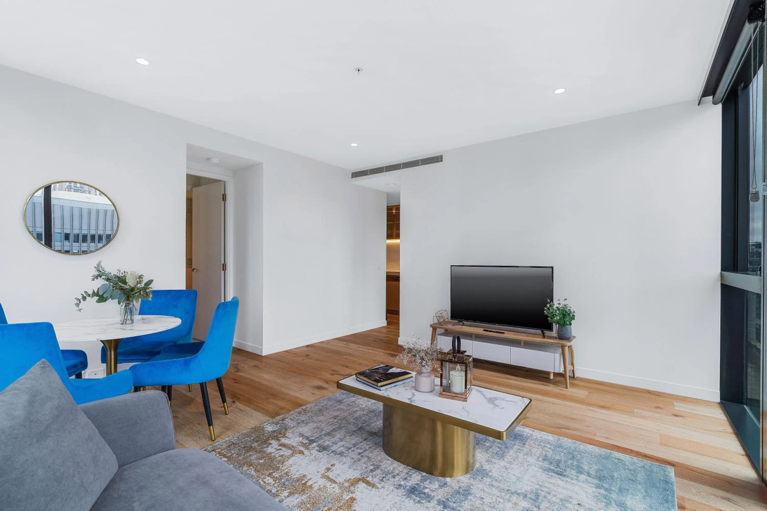 TV and multimedia in Collins House Apartments by CLLIX