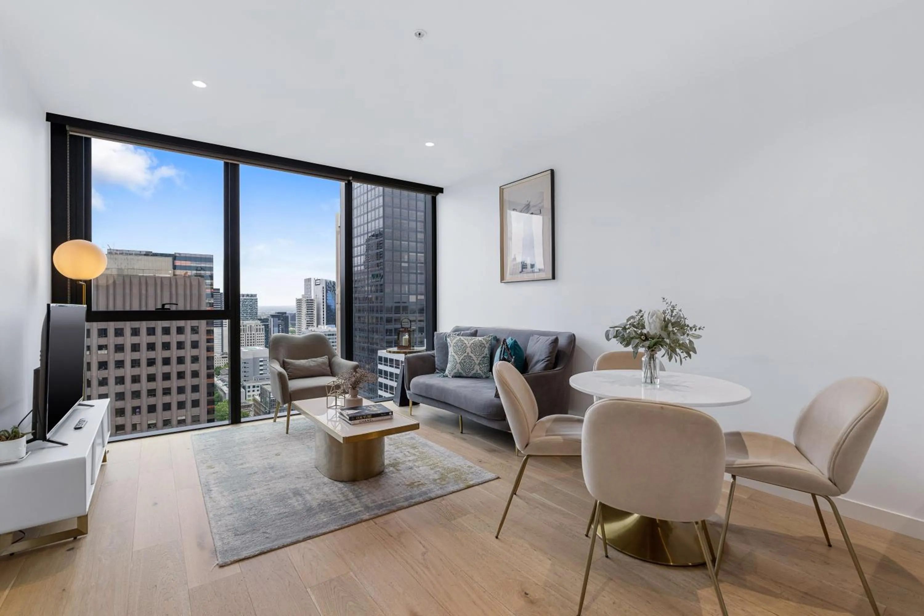 Living room in Collins House Apartments by CLLIX