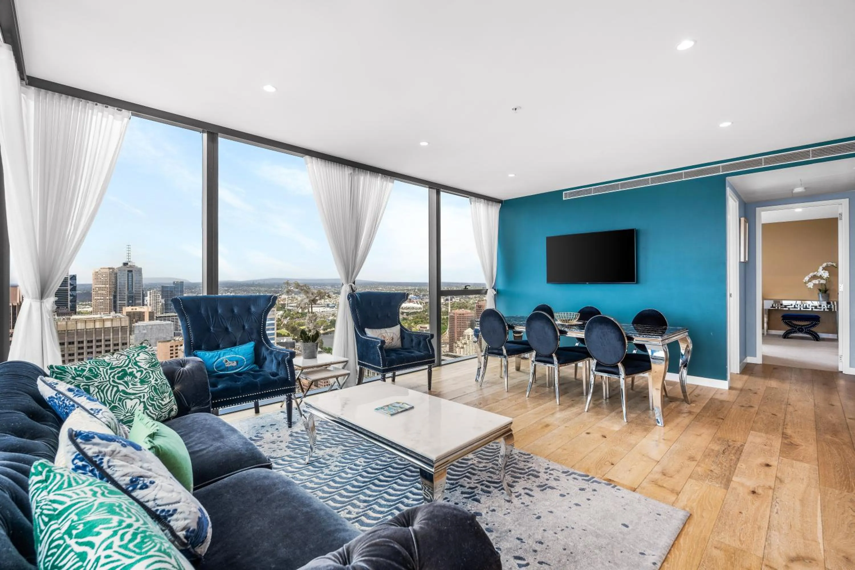 Living room in Collins House Apartments by CLLIX