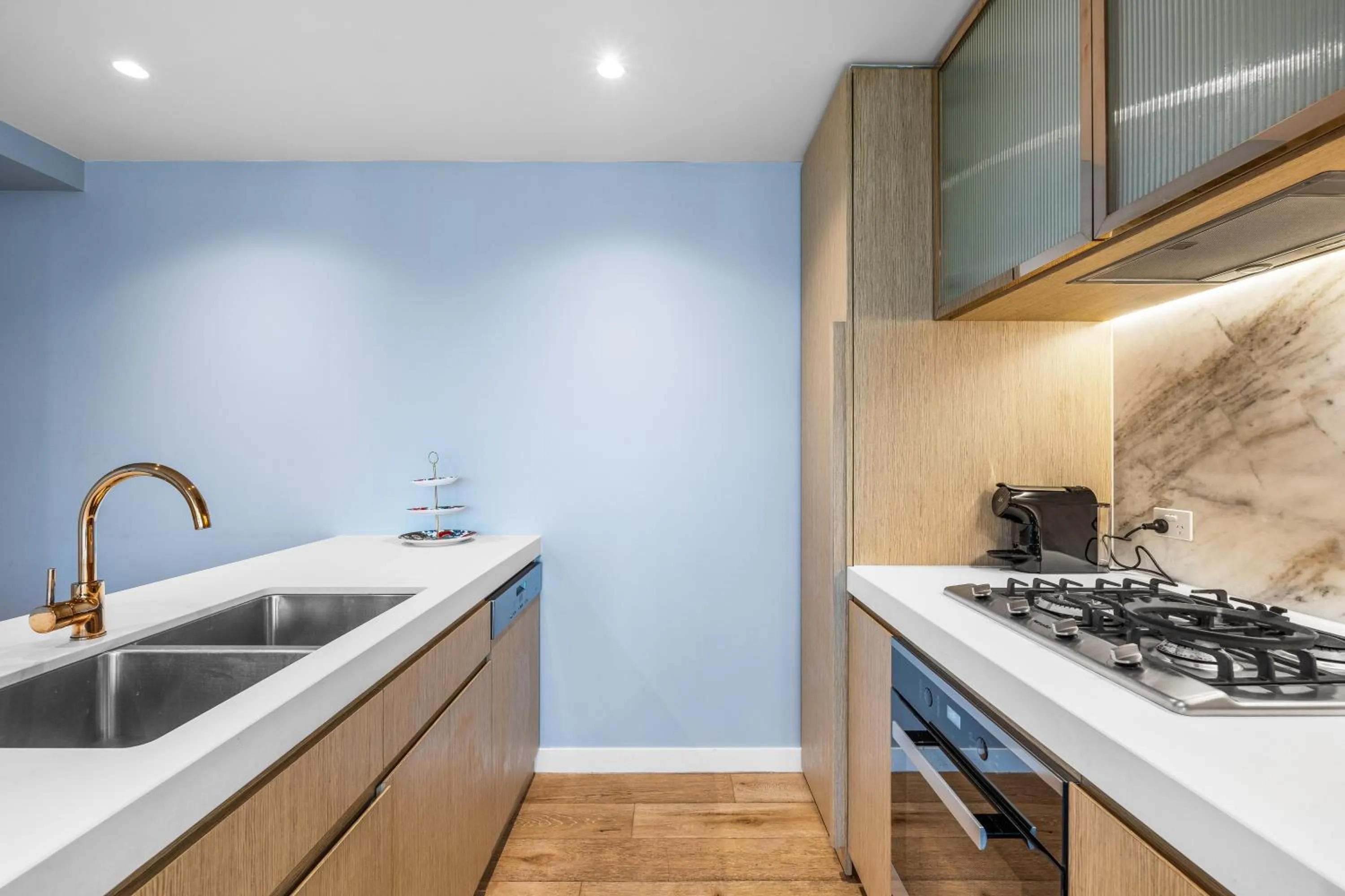 kitchen in Collins House Apartments by CLLIX
