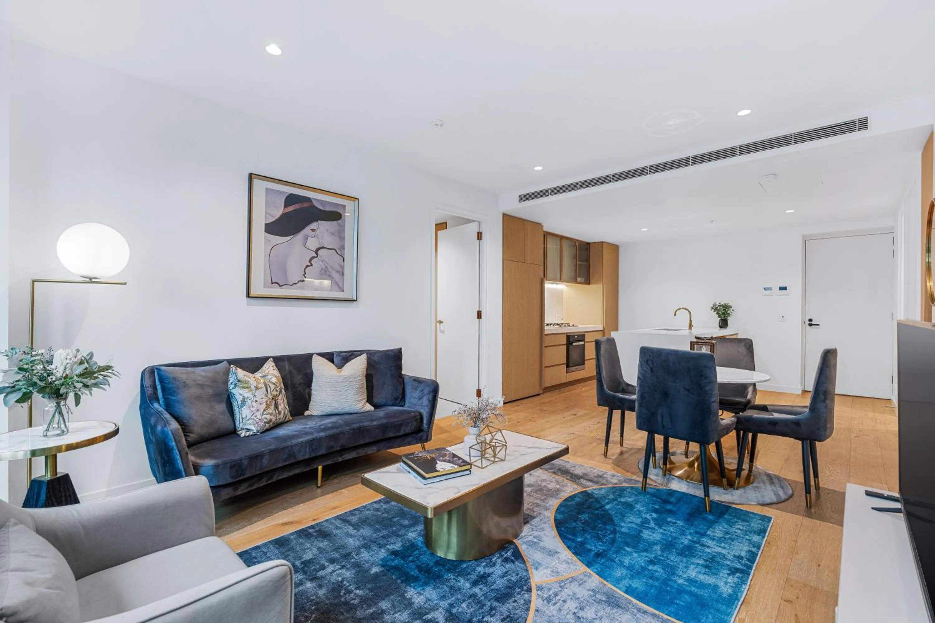 Living room in Collins House Apartments by CLLIX