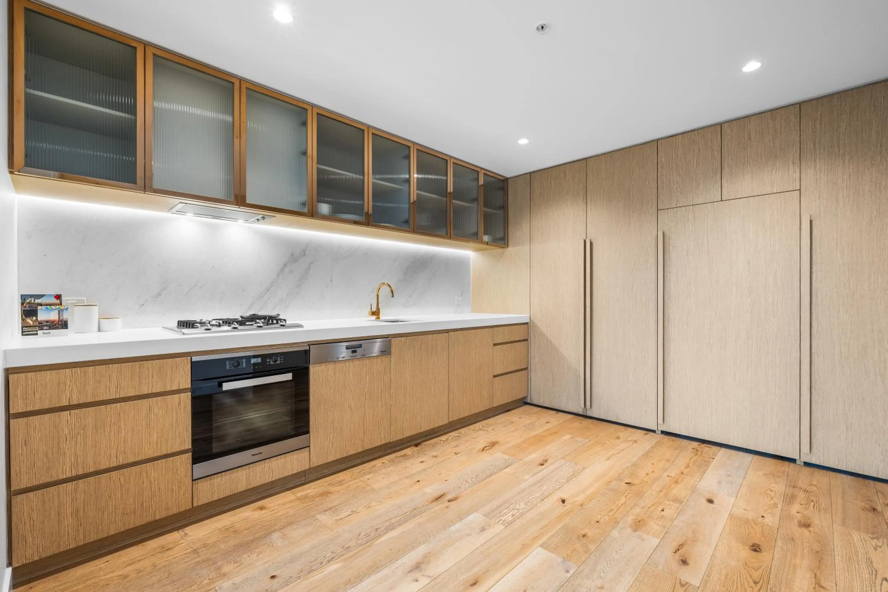 kitchen in Collins House Apartments by CLLIX