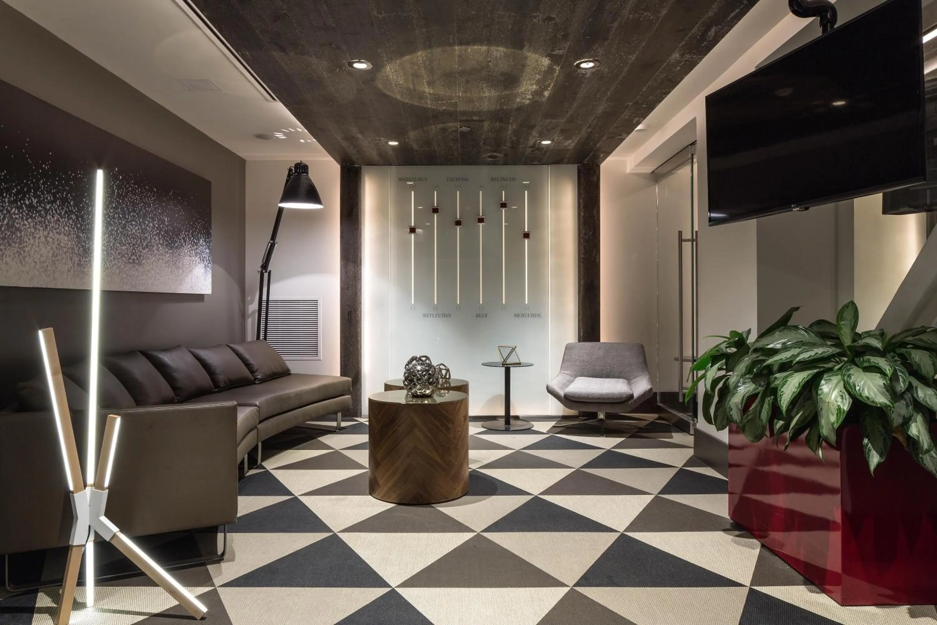 Communal lounge/ TV room in The Windsor Suites