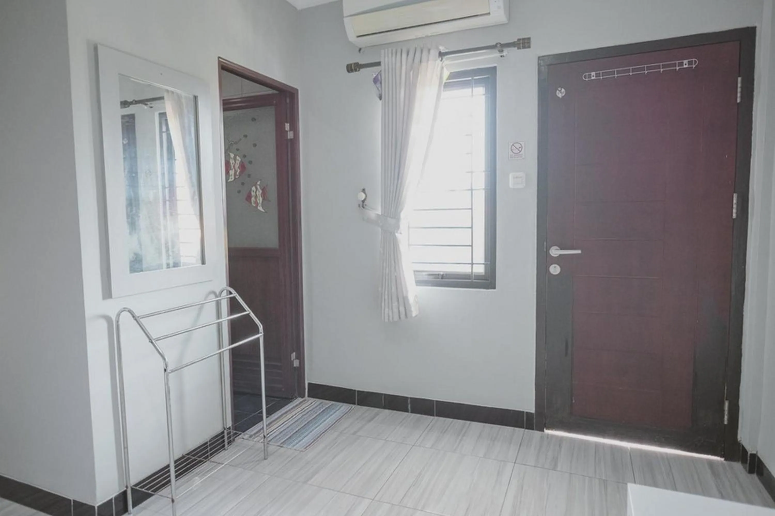 TV and multimedia in RedDoorz Syariah near Kantor Walikota Jambi