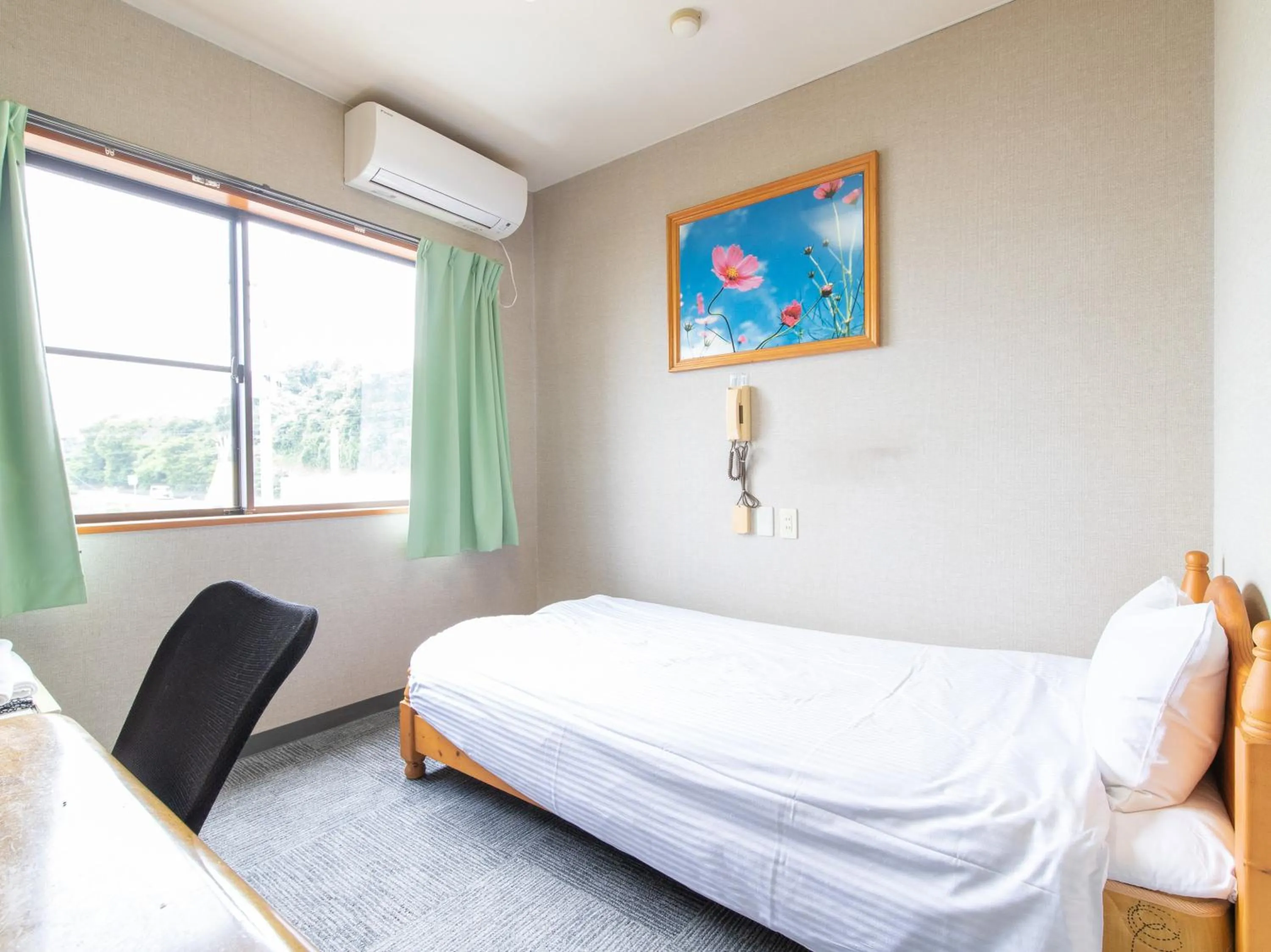 Photo of the whole room, Bed in Tabist Izumi Yusen Shukuhaku Center