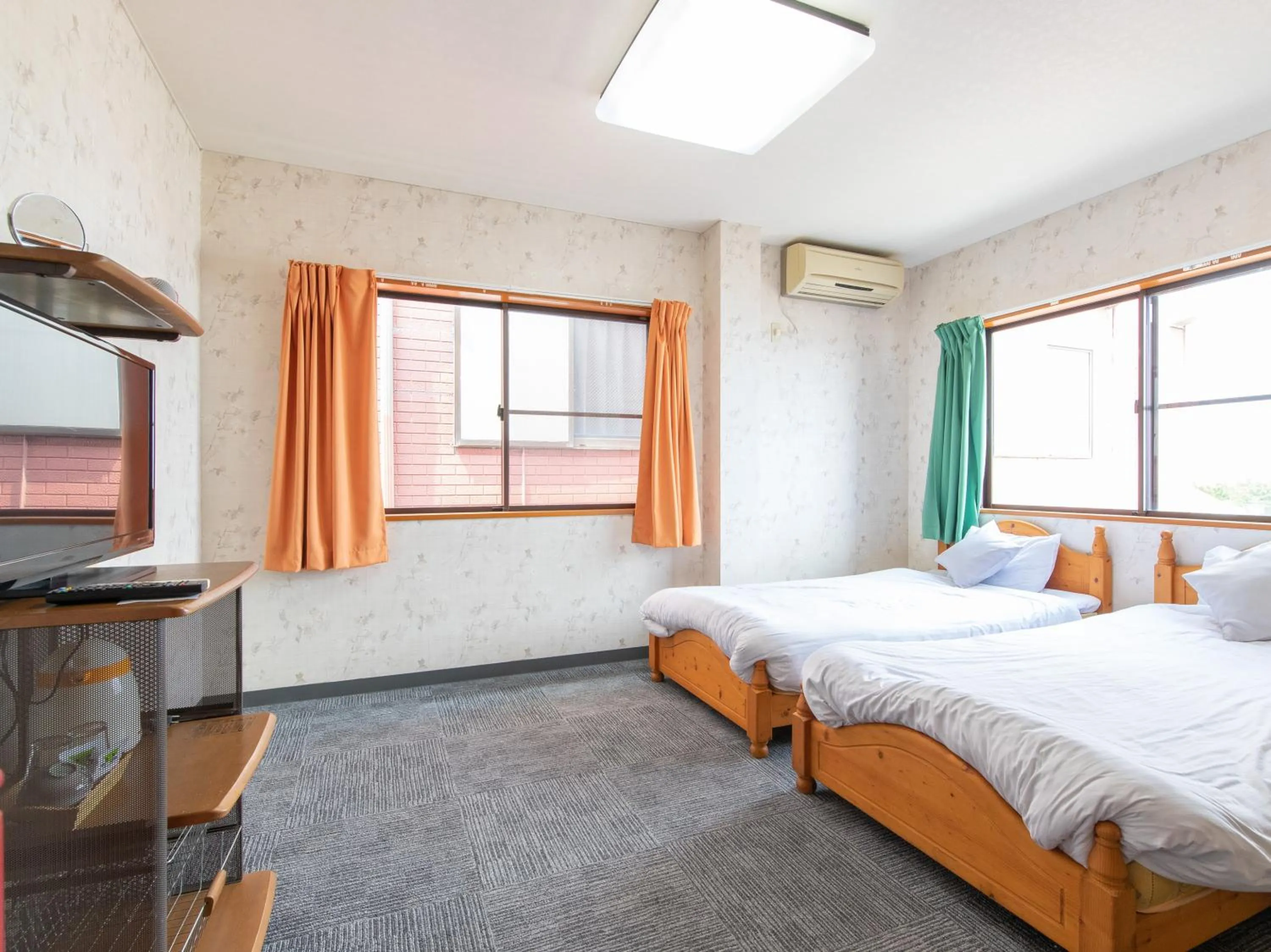 Photo of the whole room, Bed in Tabist Izumi Yusen Shukuhaku Center