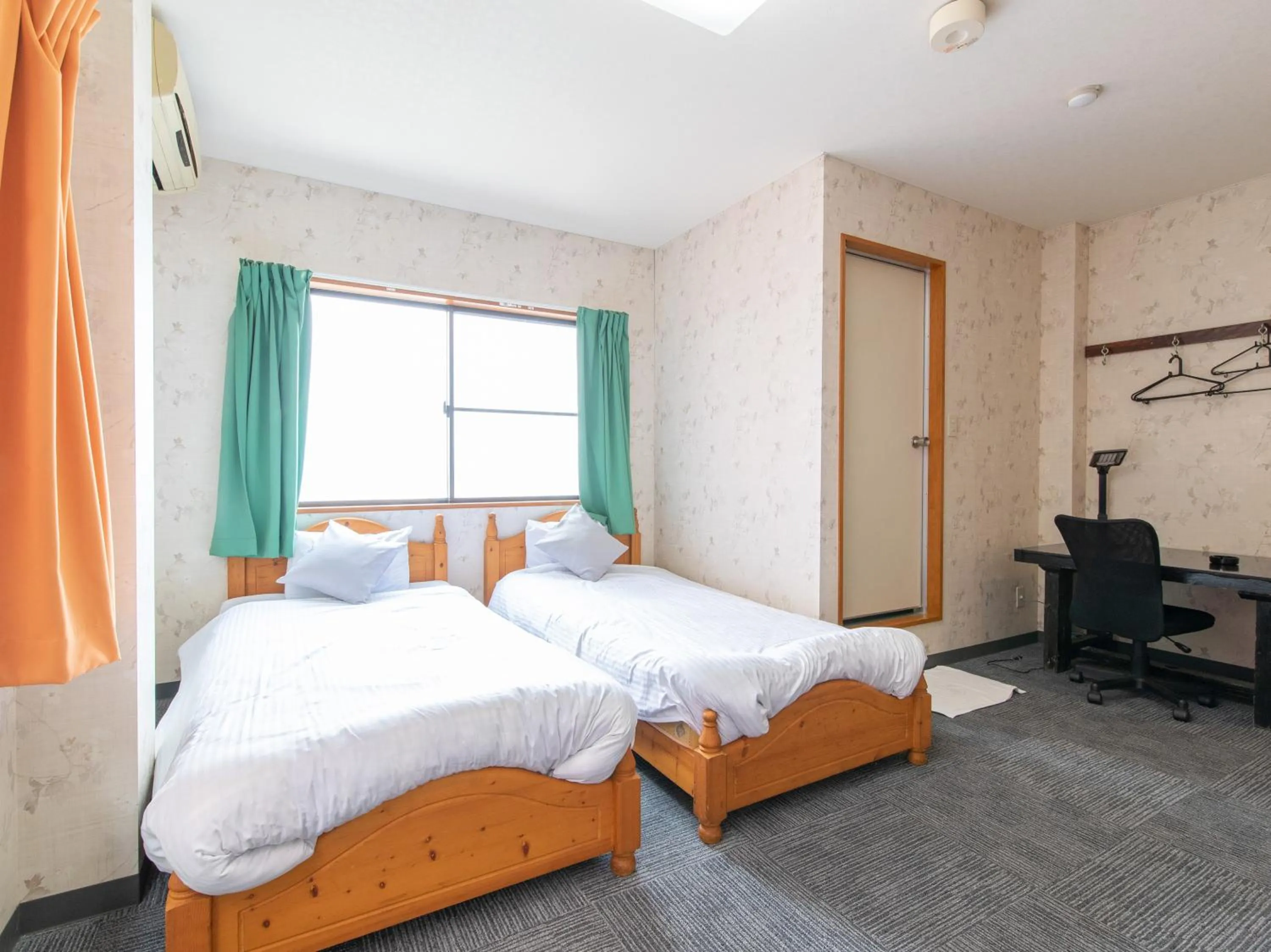 Photo of the whole room, Bed in Tabist Izumi Yusen Shukuhaku Center