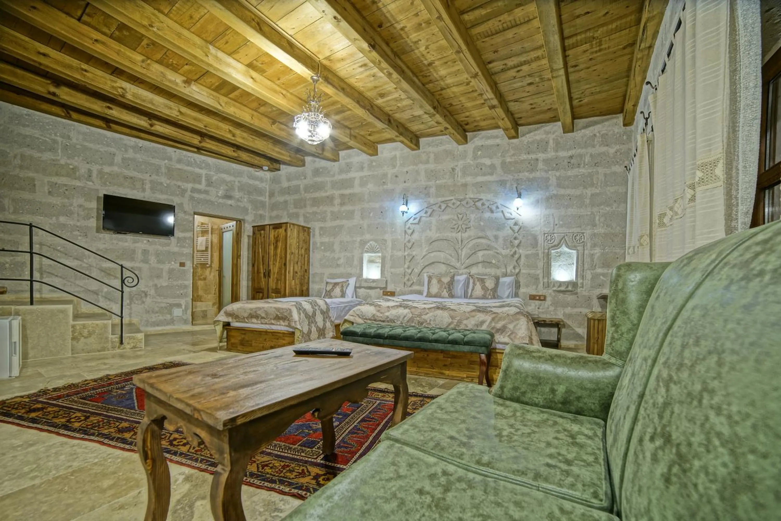 Living room in Risus Cave Suites
