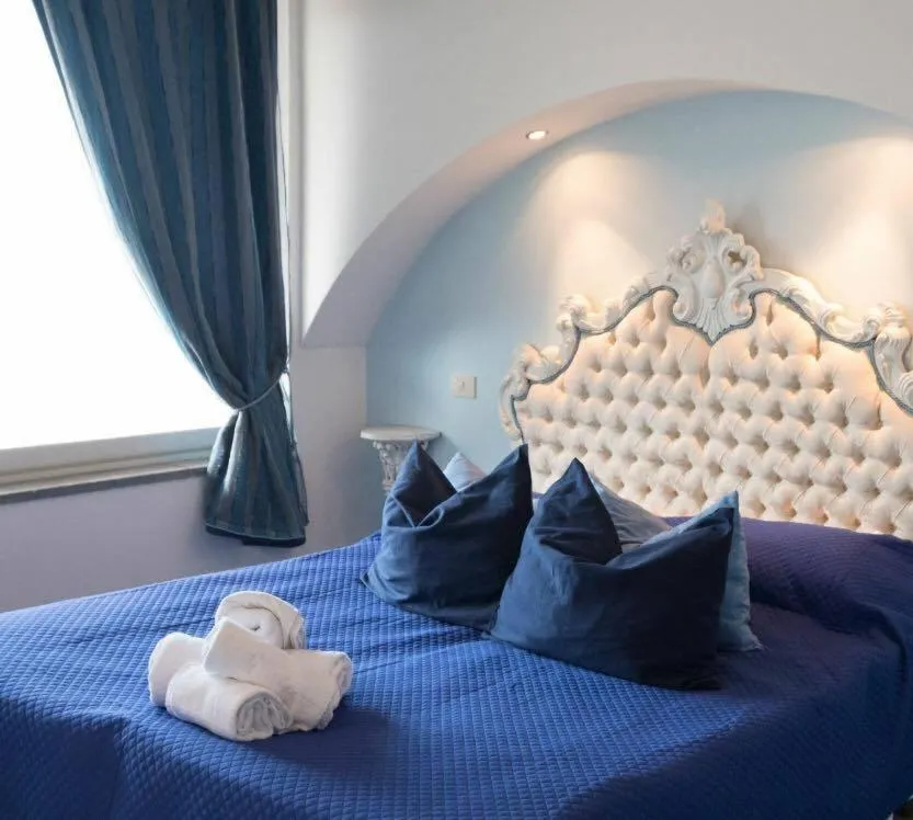 Bed in Villa Neptunus