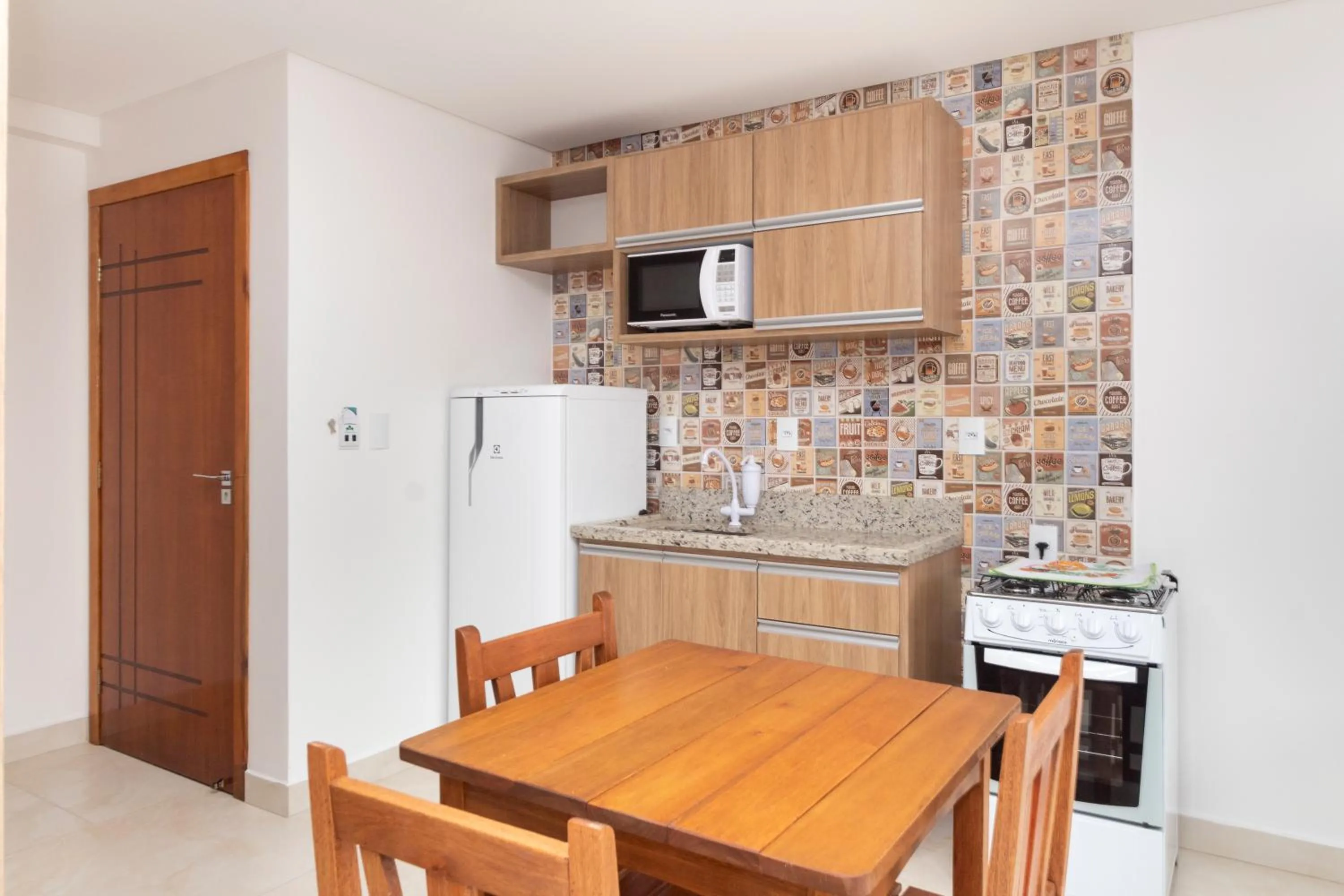 Communal kitchen in Apart Hotel Canto Grande