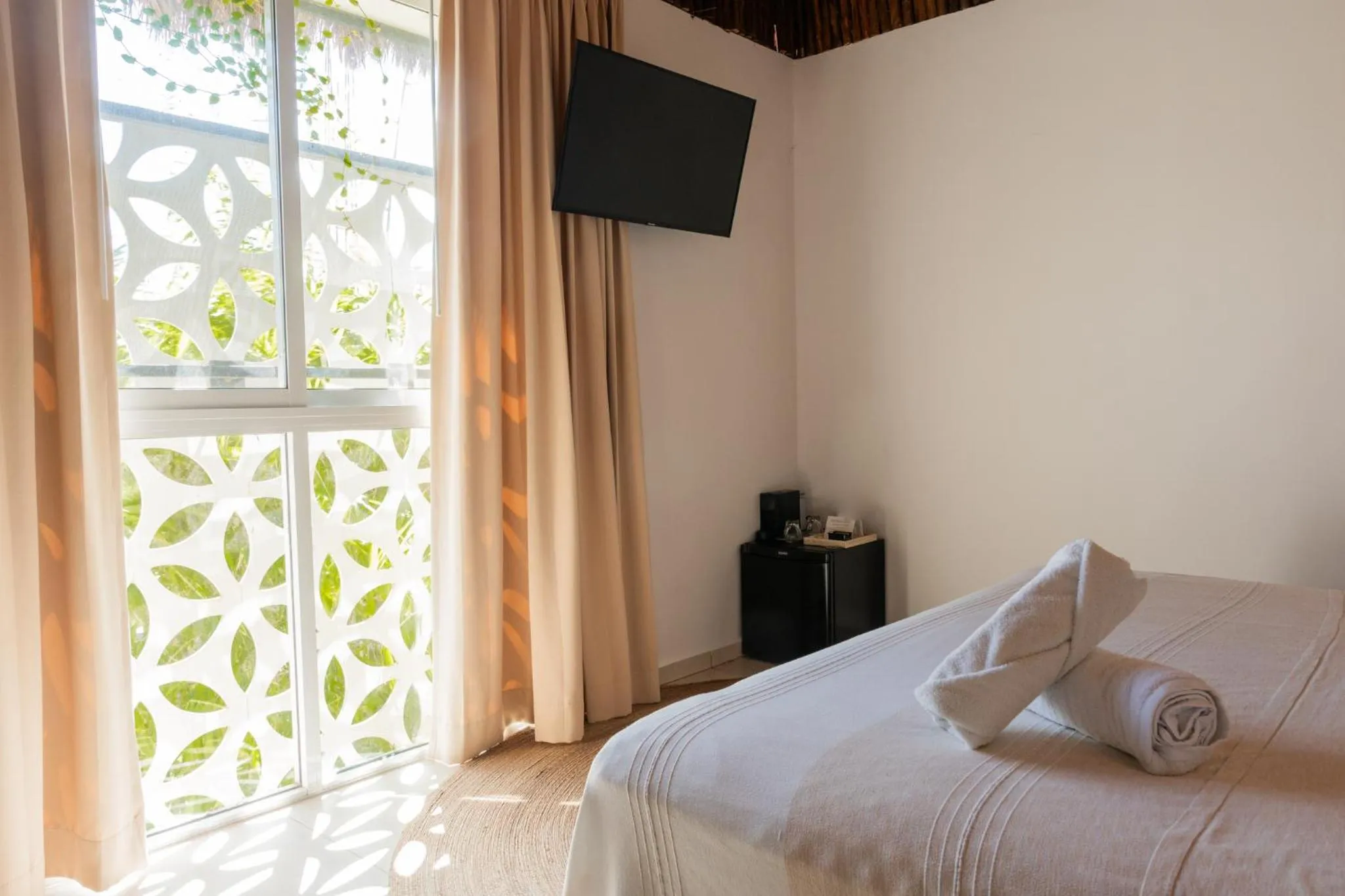 Bed in AGAM Hotel Boutique Bacalar - Adults Only