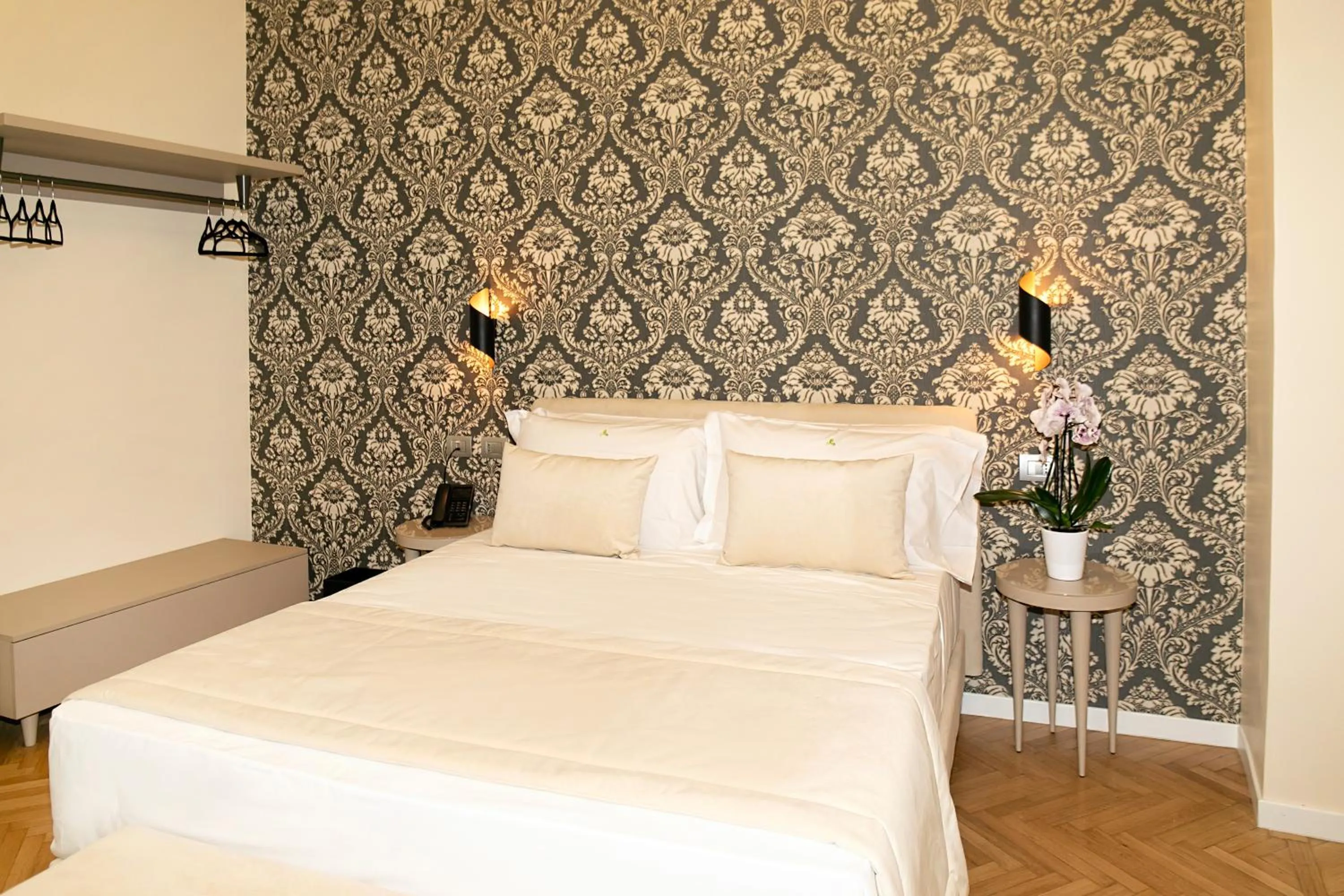 Bed in Hotel Caravita