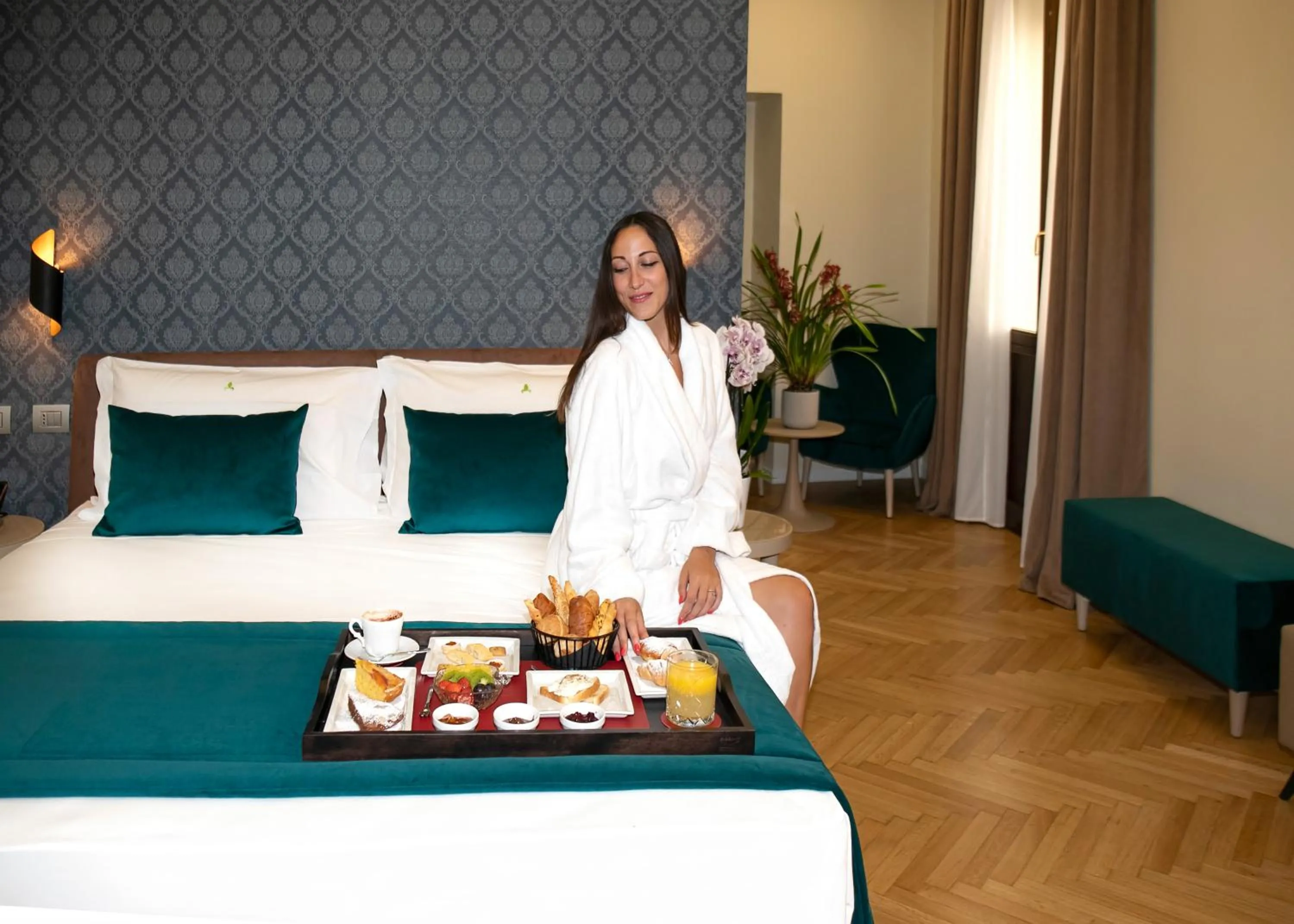 Bed in Hotel Caravita