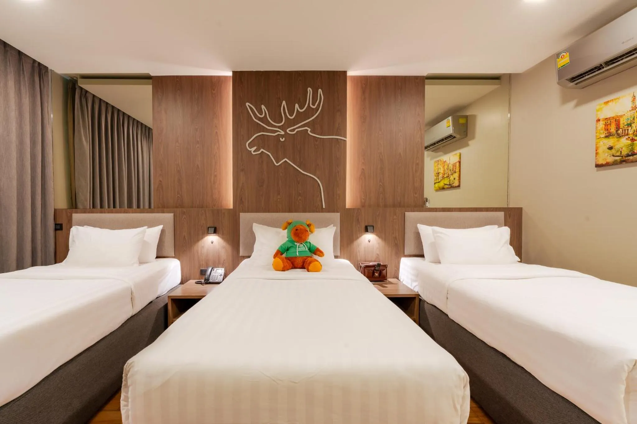 Bed in Moose Hotel Chiangmai