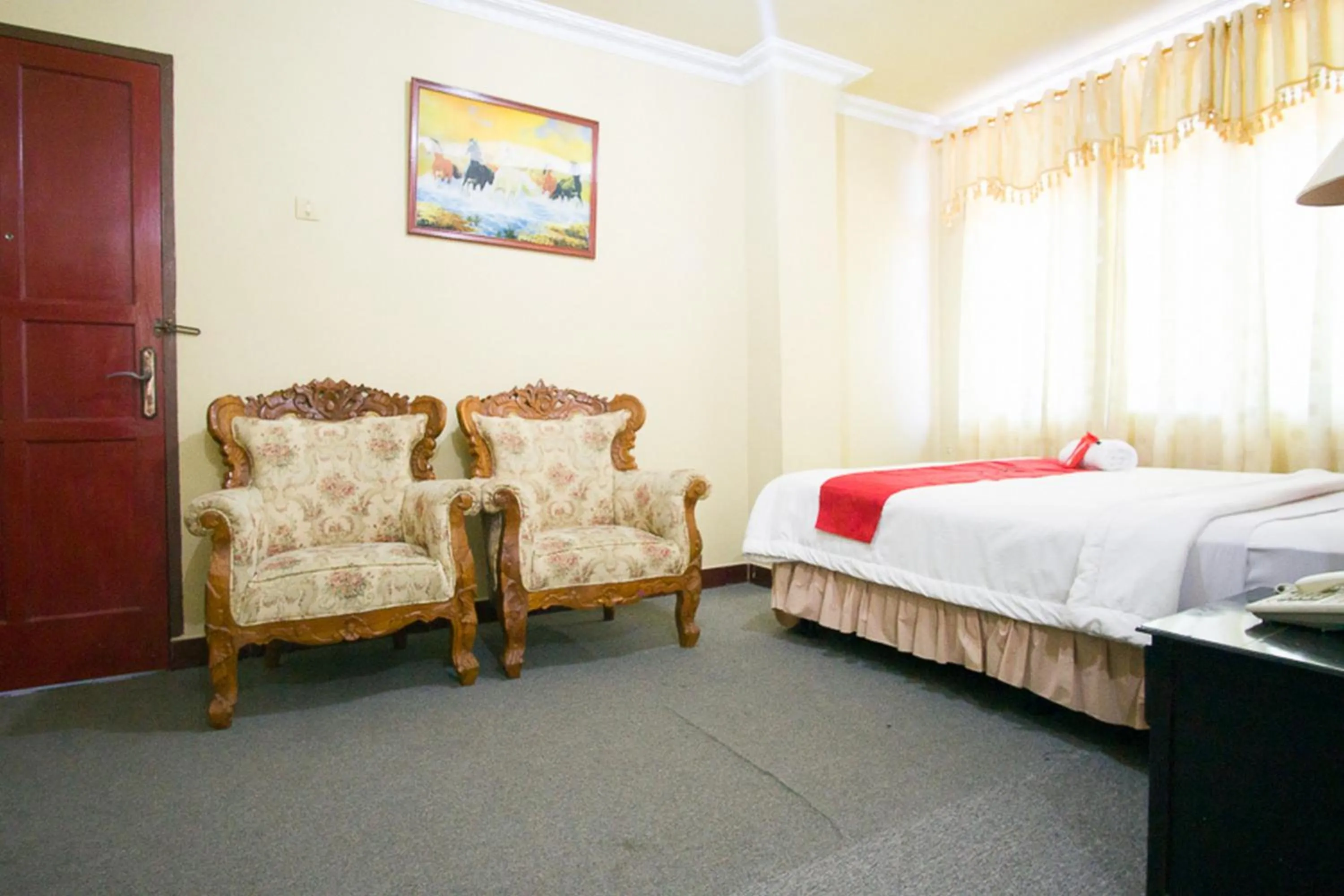 Bed in RedDoorz plus near Pelabuhan Bitung