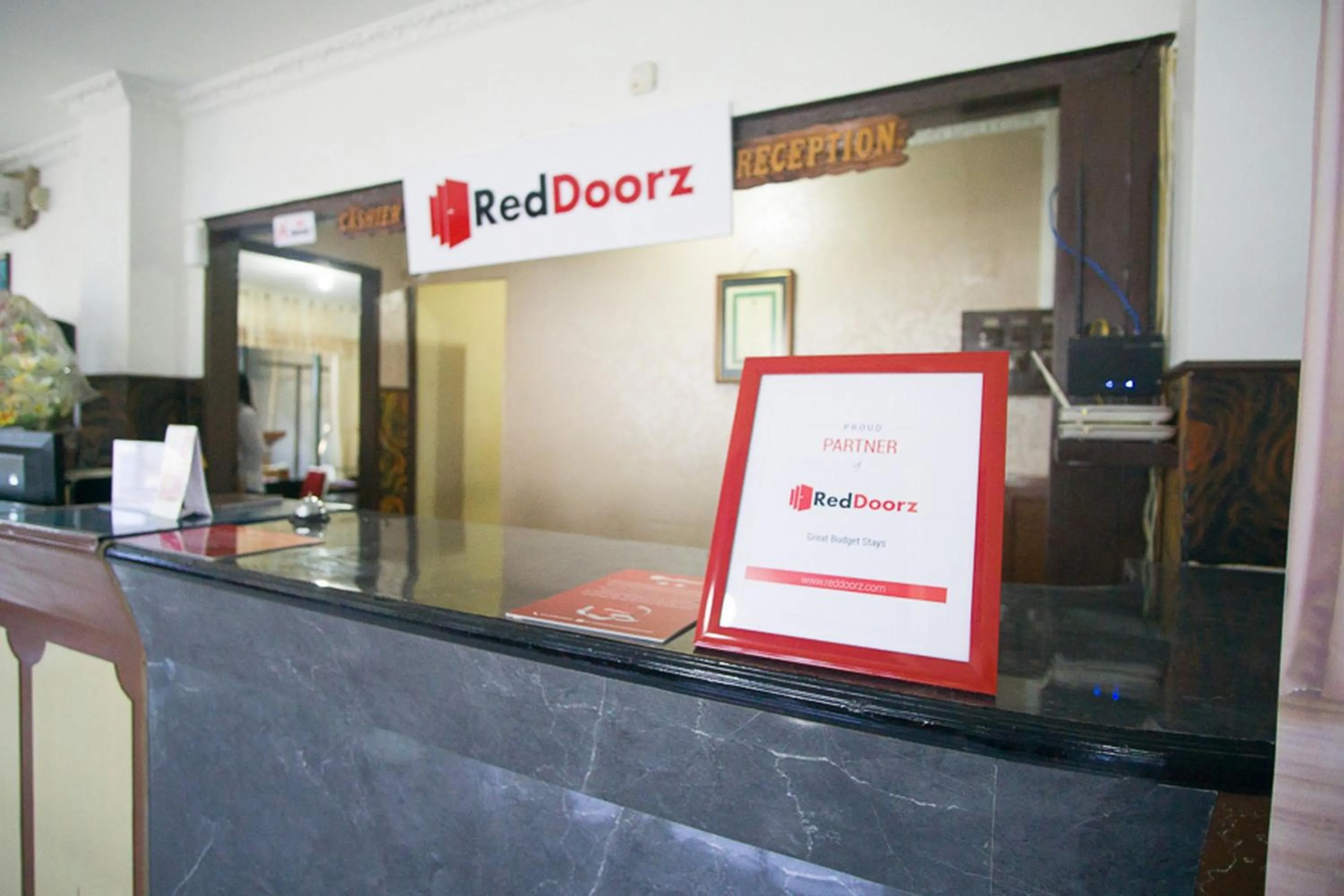 Lobby or reception in RedDoorz plus near Pelabuhan Bitung