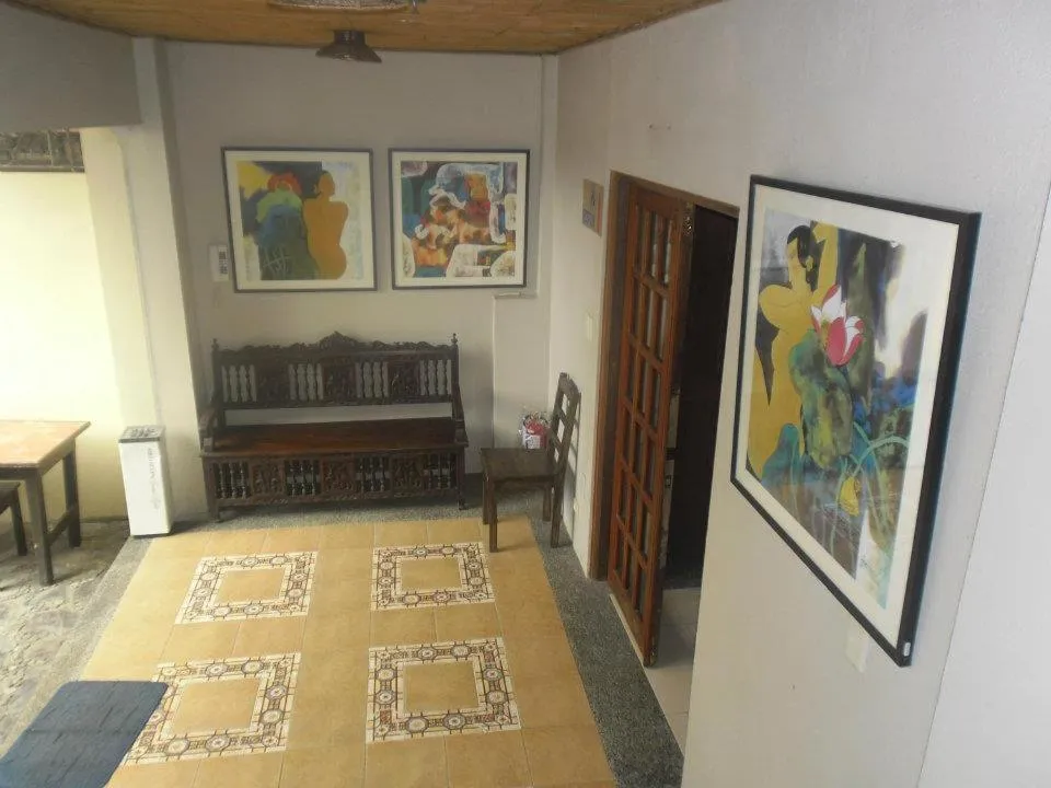 Seating area in Alfonso Hotel