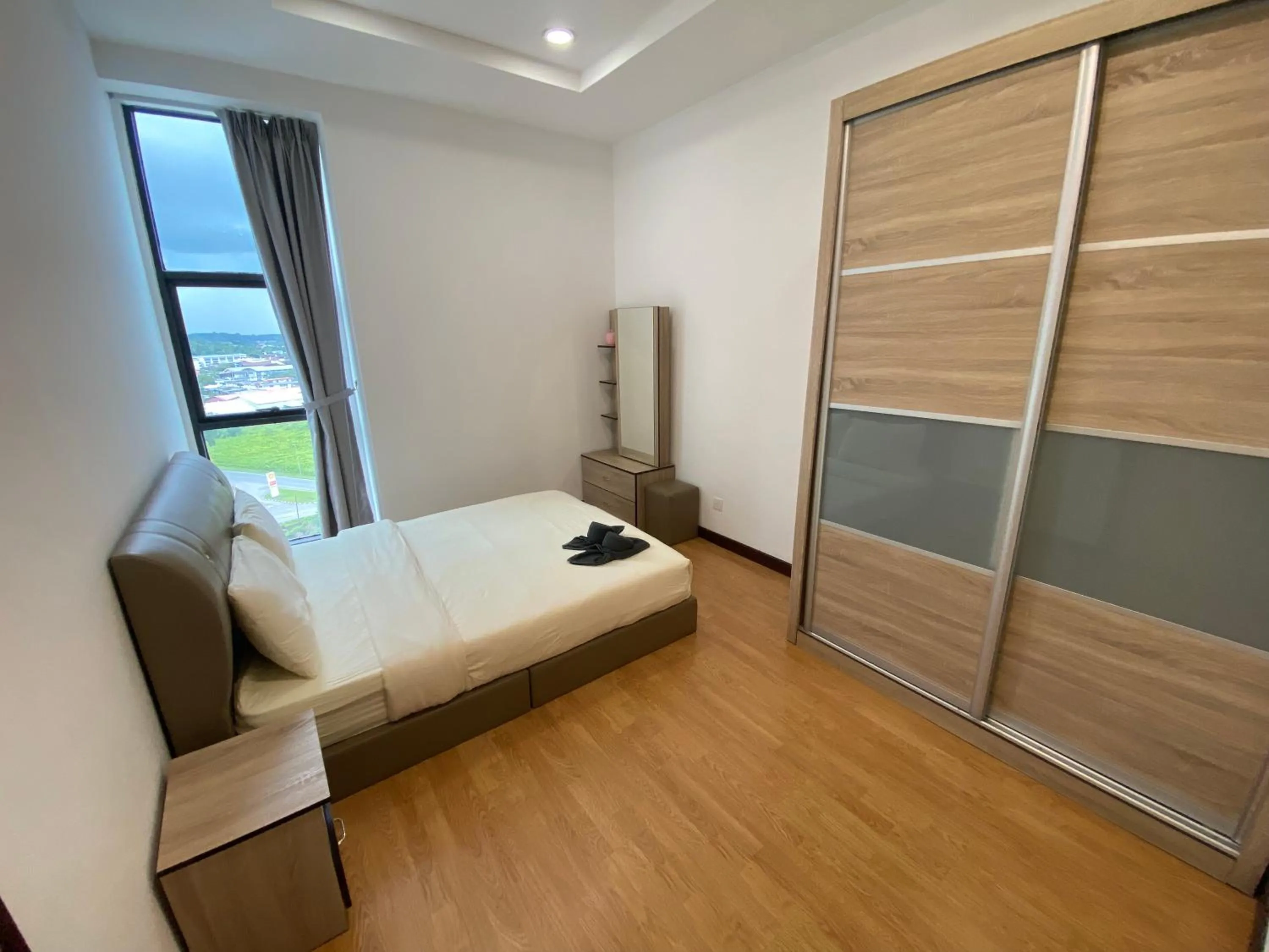 Bed in Imperial Suites at Boulevard Mall