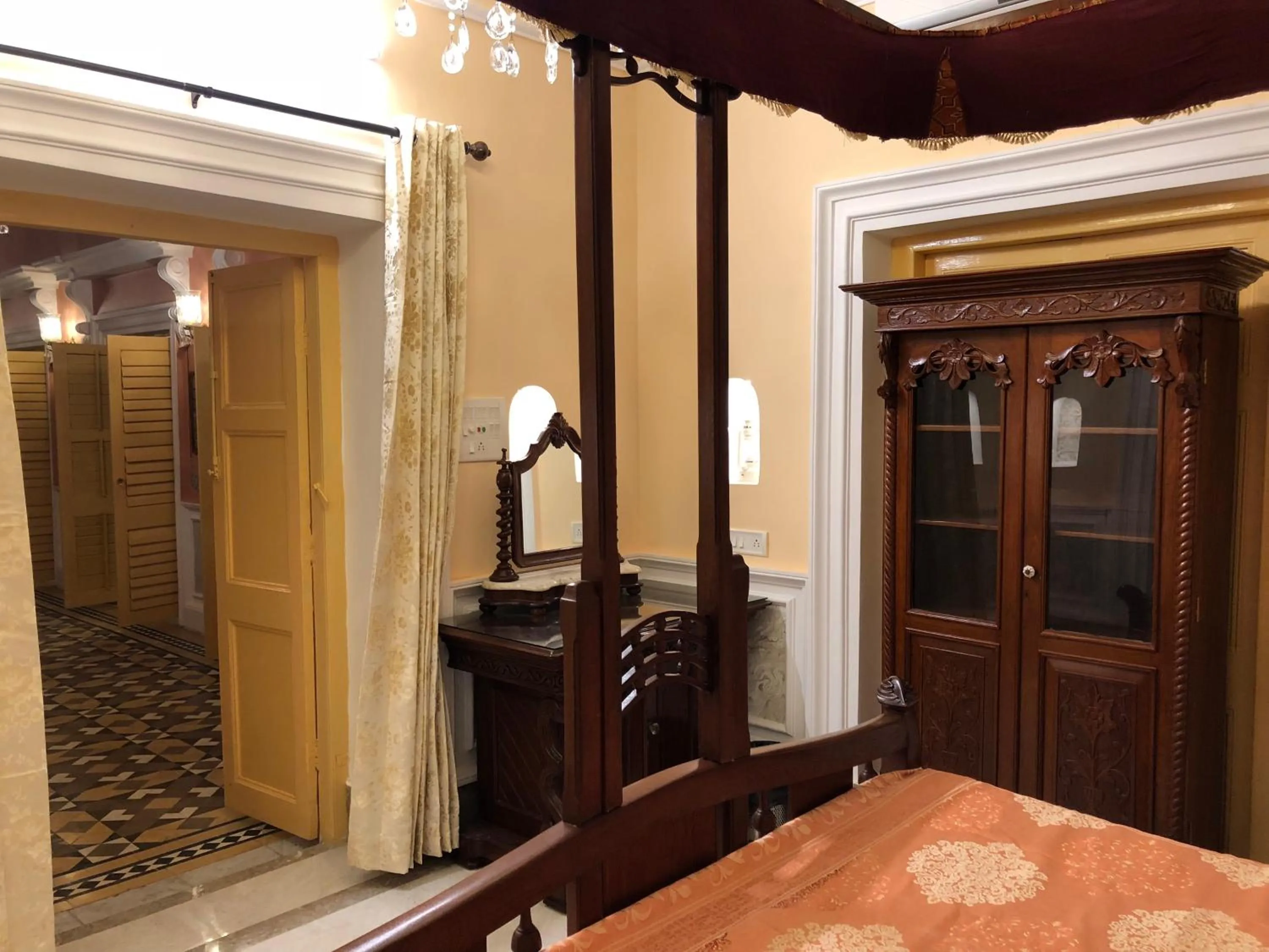 Bed in COSSIMBAZAR PALACE OF THE ROYS ( RAJBARI)