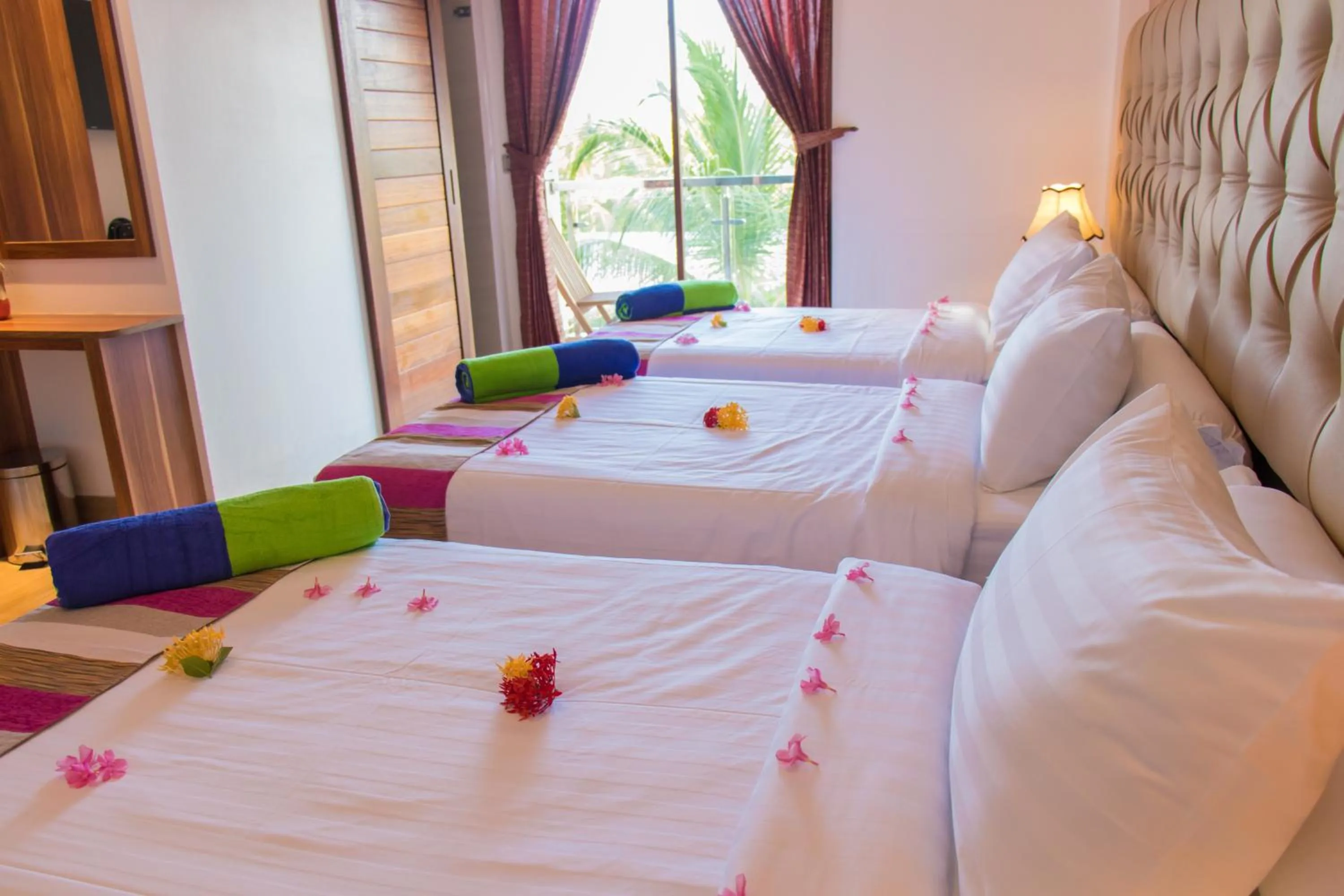 Bed in Rosy Villa Hotel