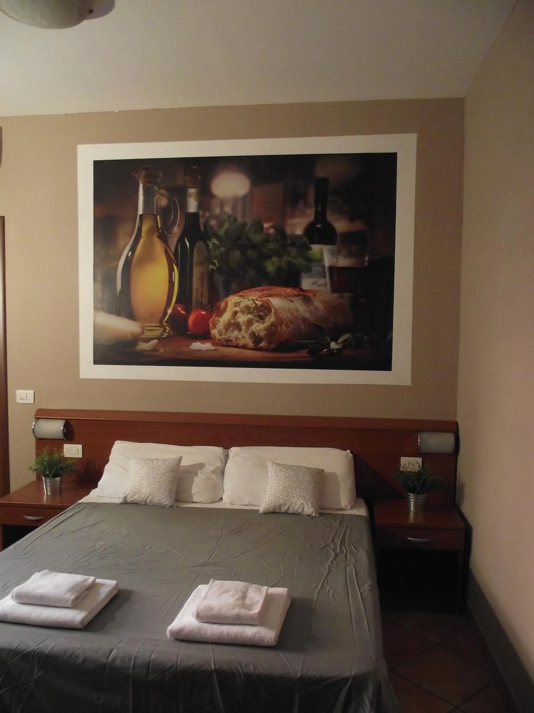 Bedroom in La Corte Albergo