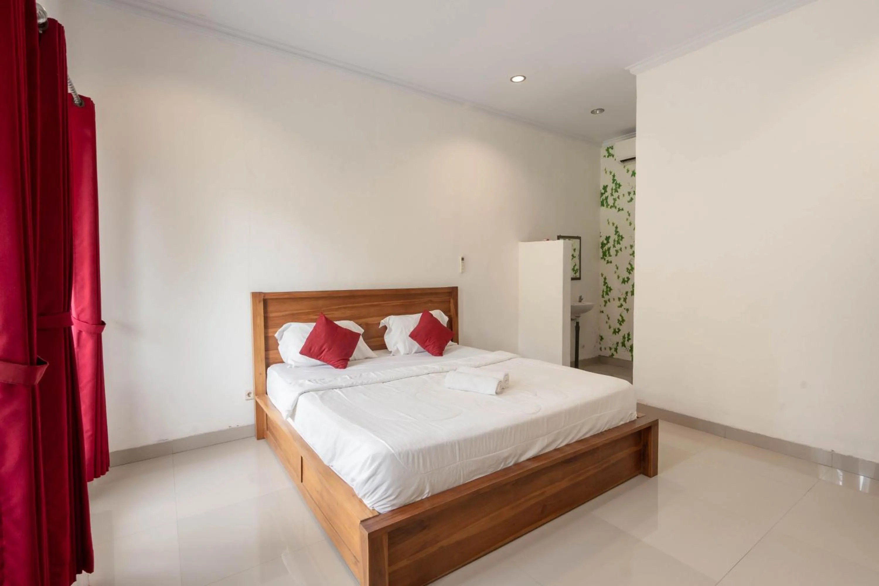 Bed in Omah Nusa Guesthouse RedPartner