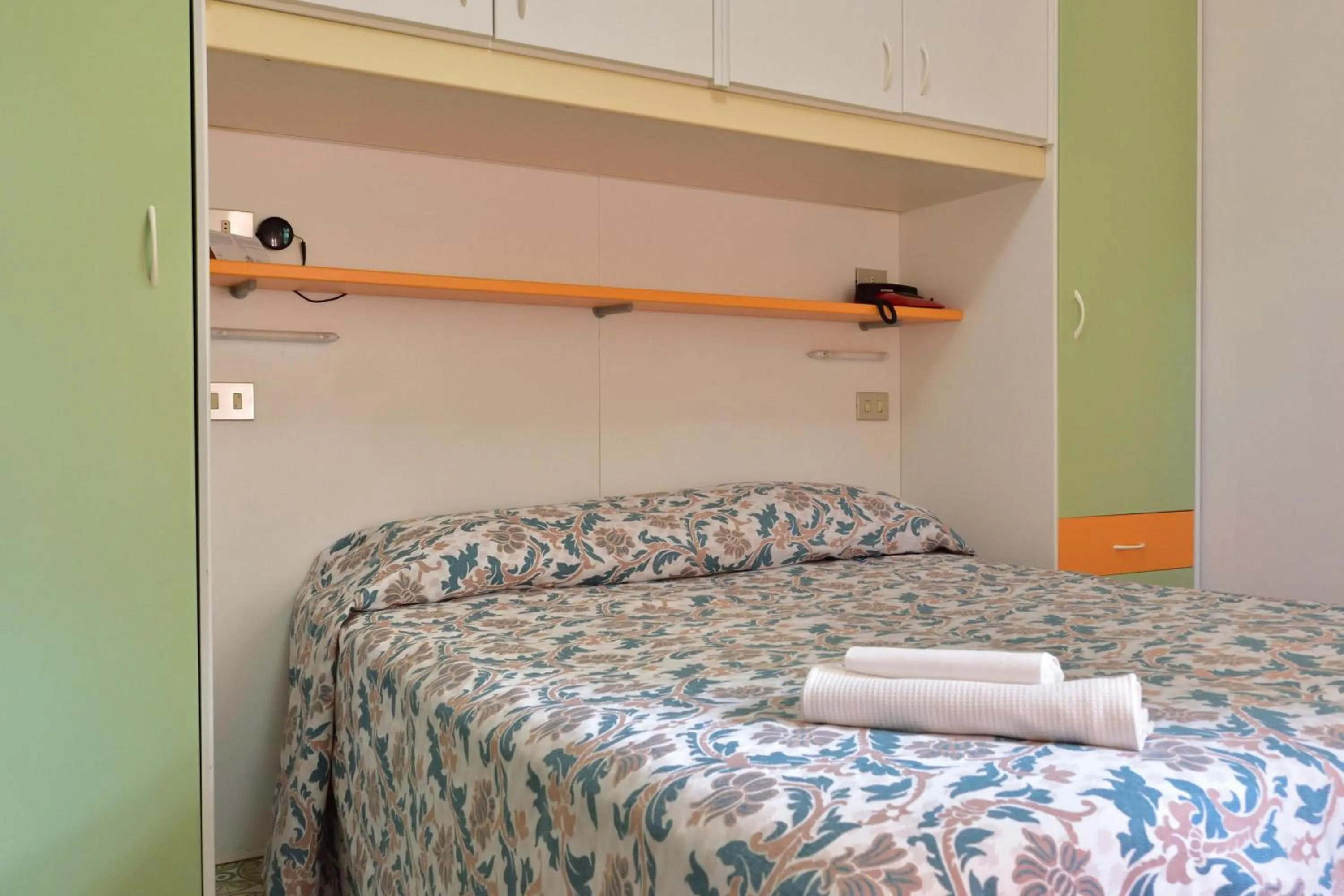 Bed in Eden Park Hotel