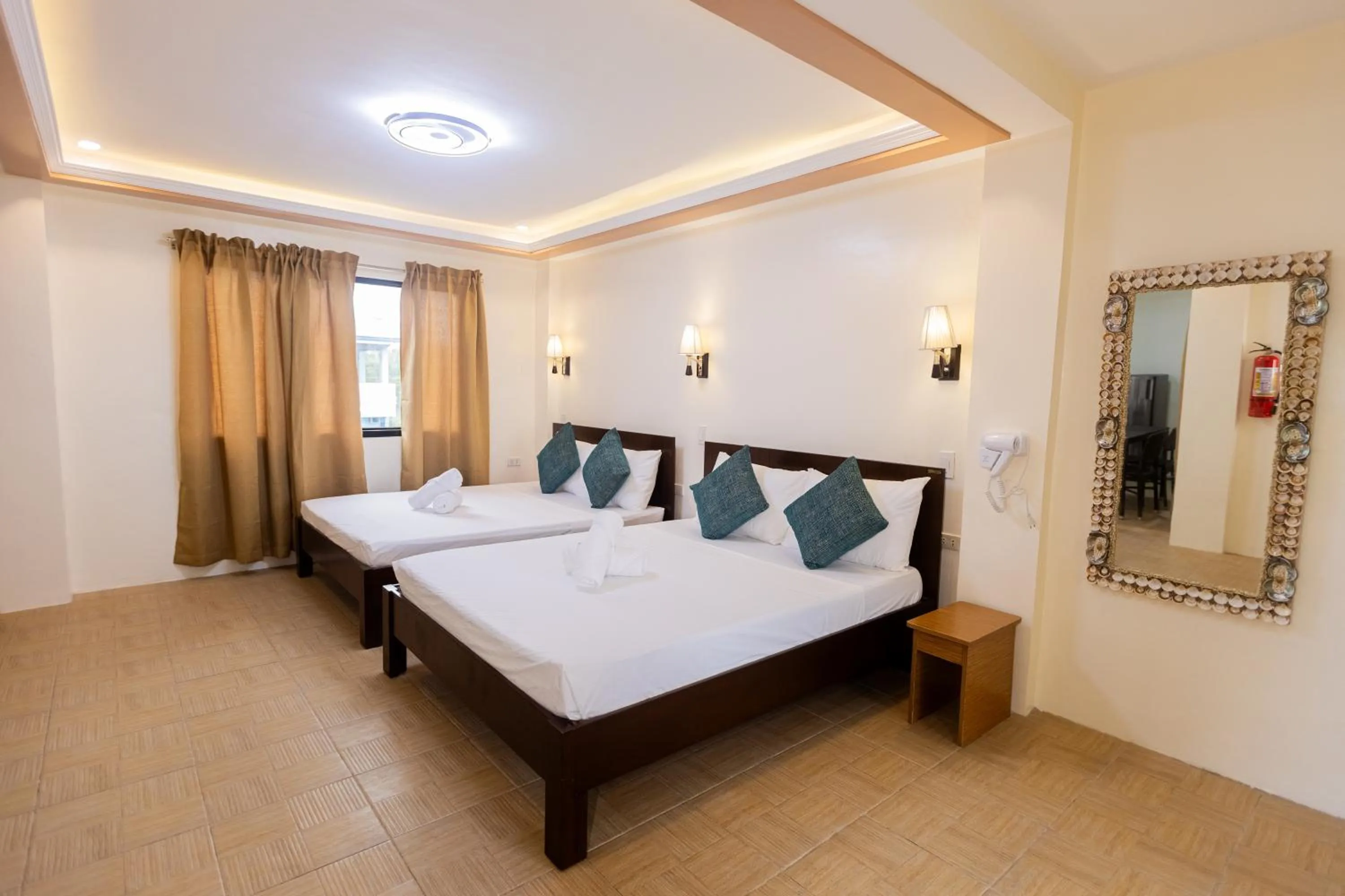 Bed in Anahaw Seaside Inn