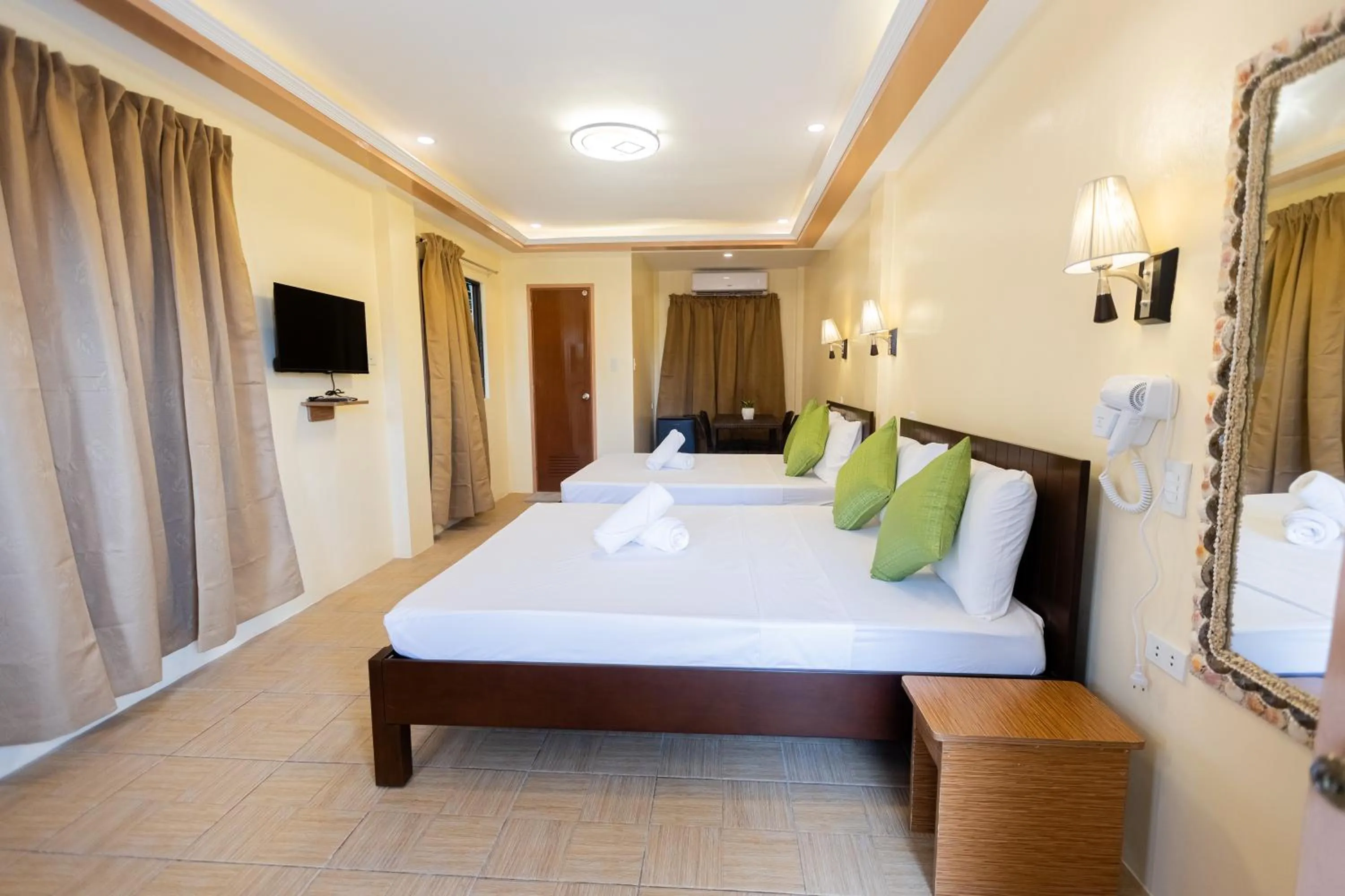 Bed in Anahaw Seaside Inn