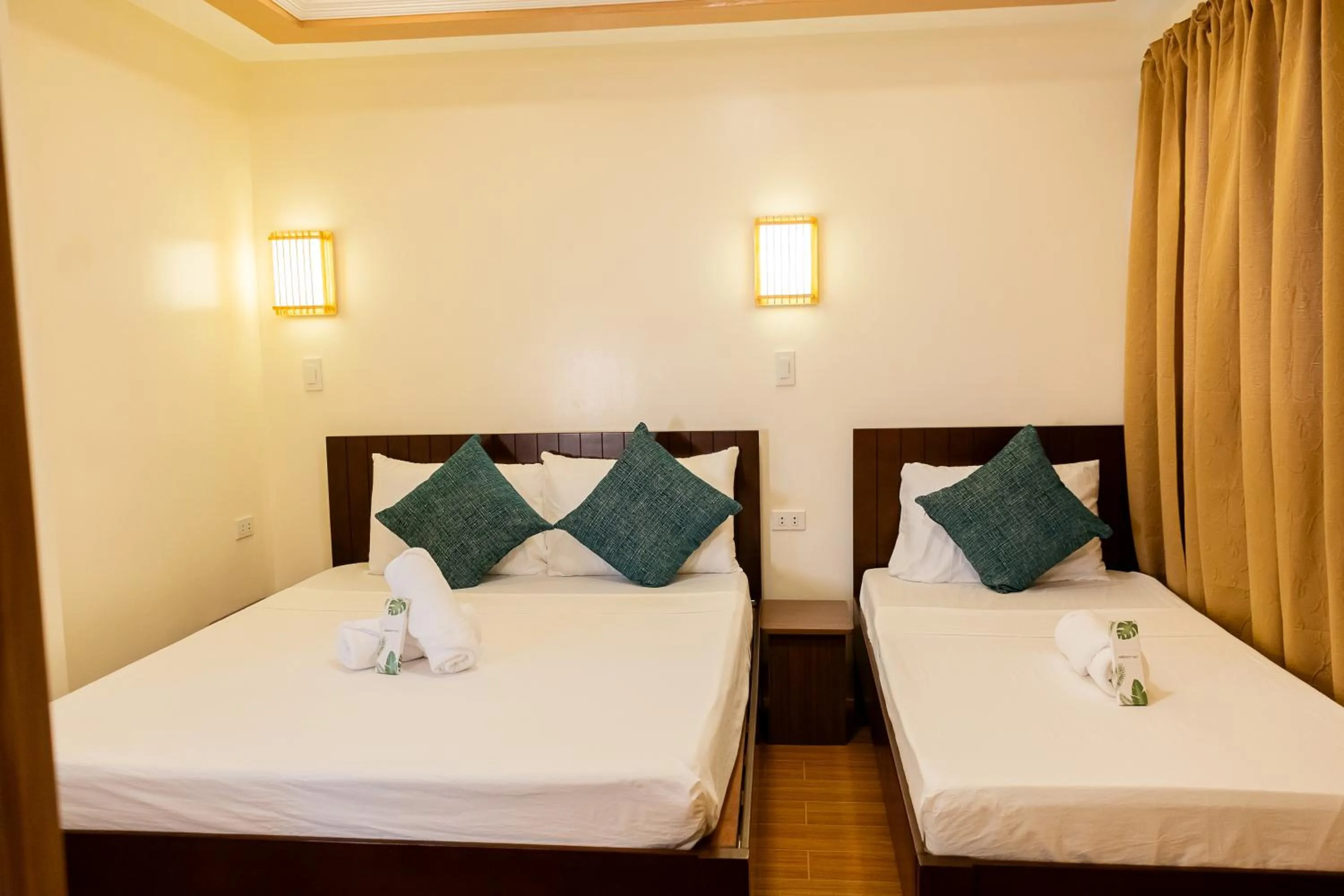 Bed in Anahaw Seaside Inn