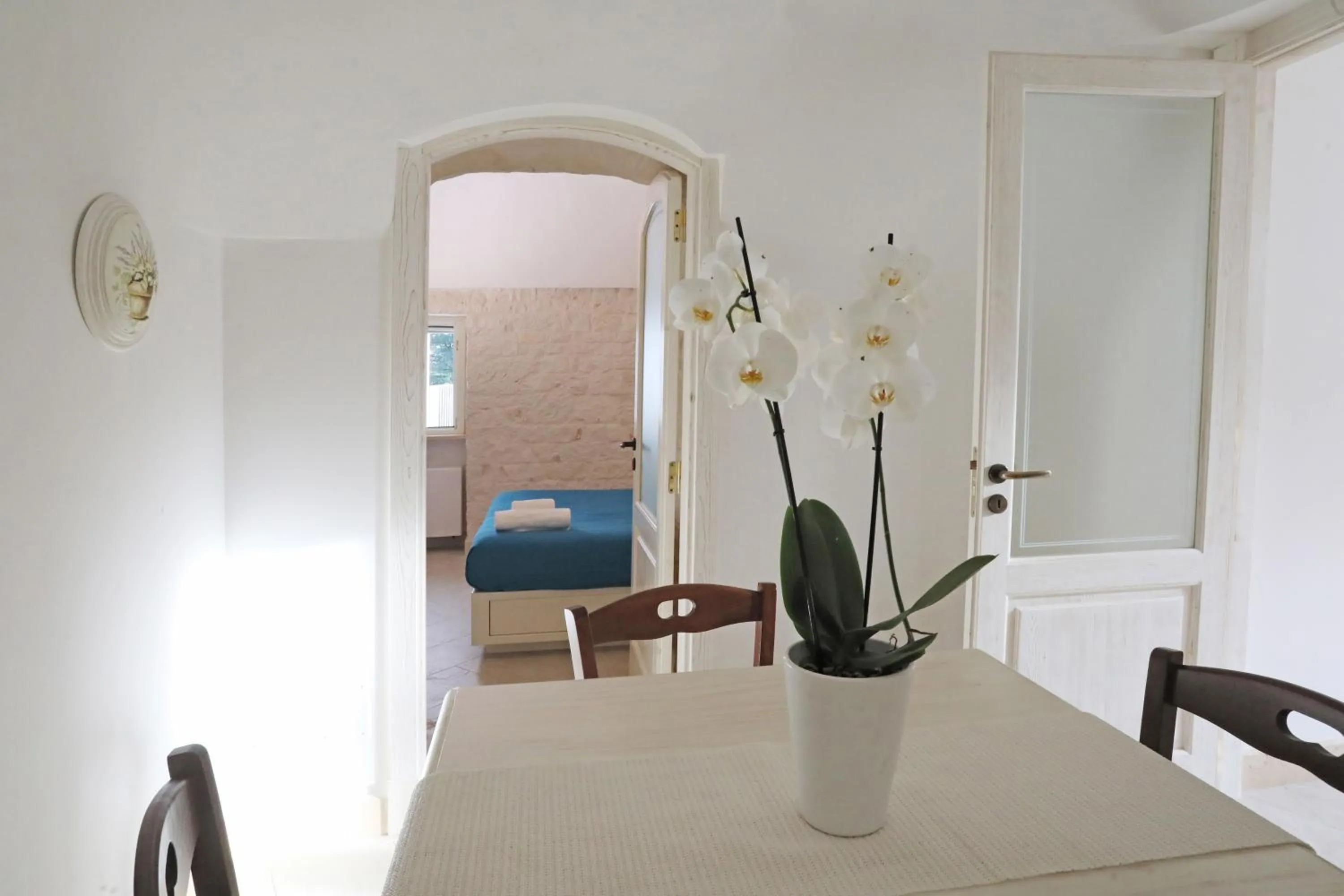 Dining area, Bed in Villa Rosato